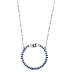 Small Give and Receive Pendant in 18 Carat White Gold Set with Blue Sapphires