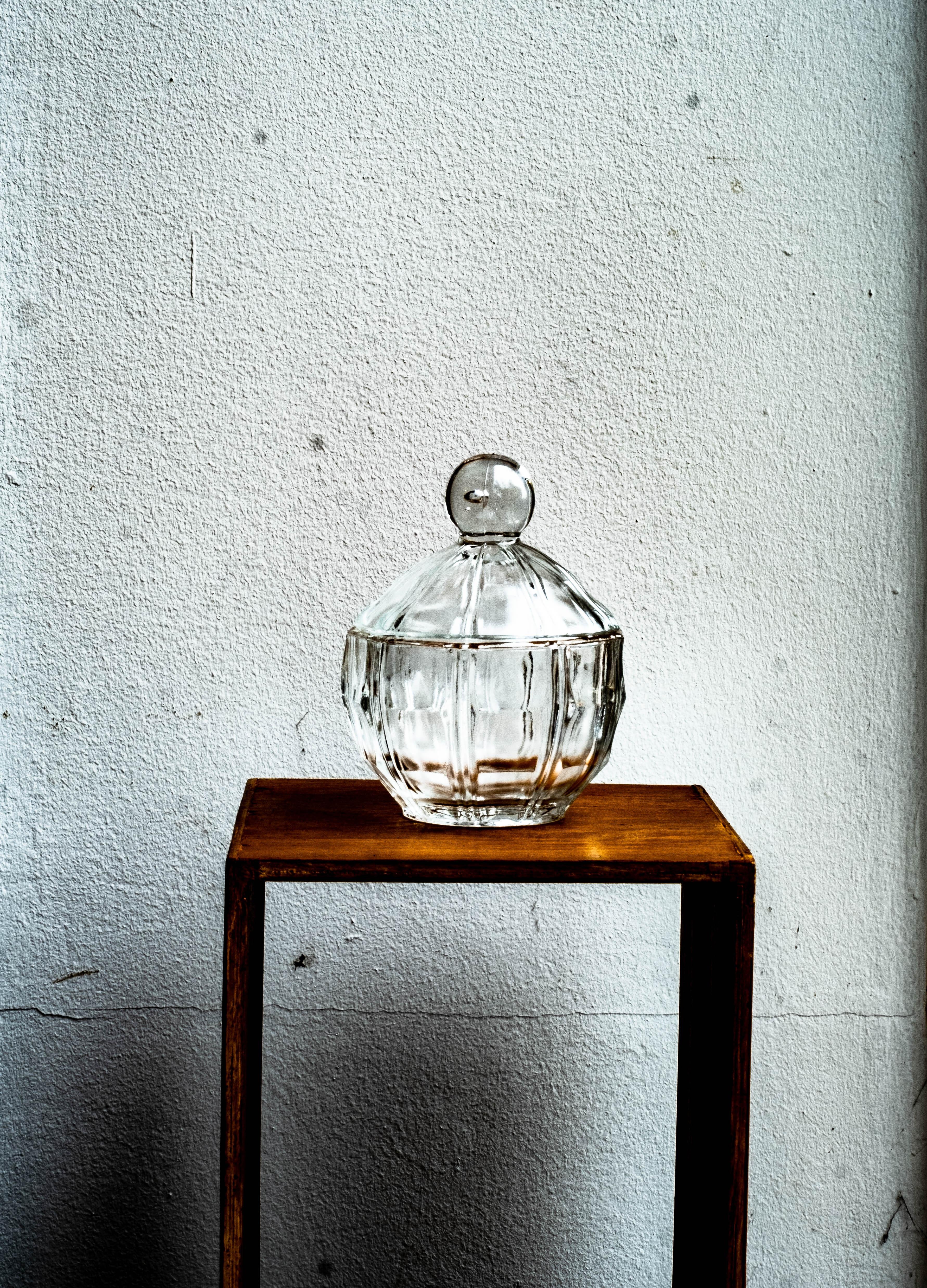 Small glass candy jar.