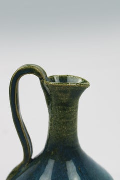 Small Glazed Ceramic Pitcher in hues of Turquoise and Green signed in the Bottom