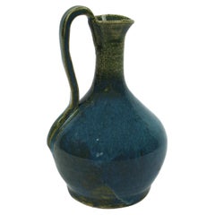 Small Glazed Ceramic Pitcher in hues of Turquoise and Green signed in the Bottom