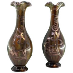 Small glazed porcelain vases with silver floral applications