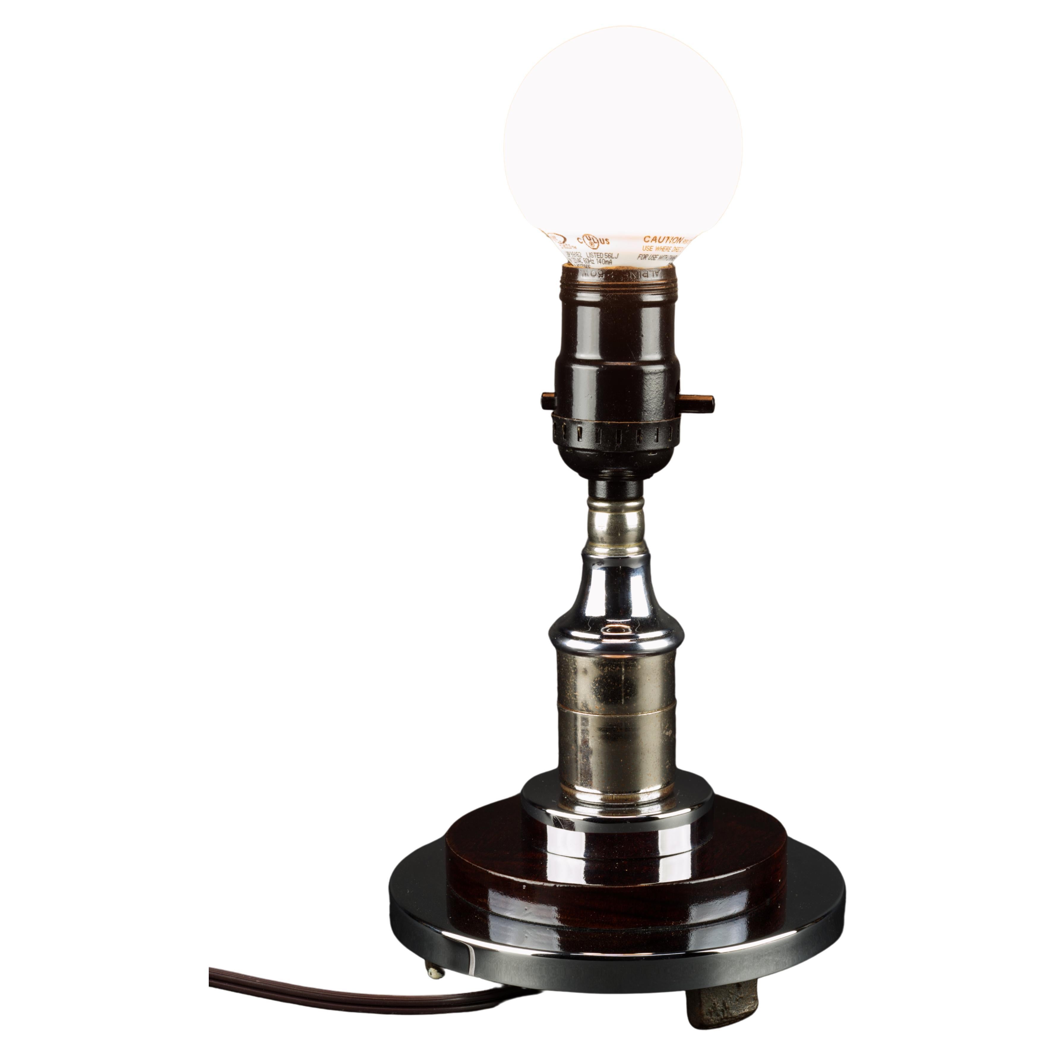Small globe table lamp in chrome and walnut. 1970s For Sale