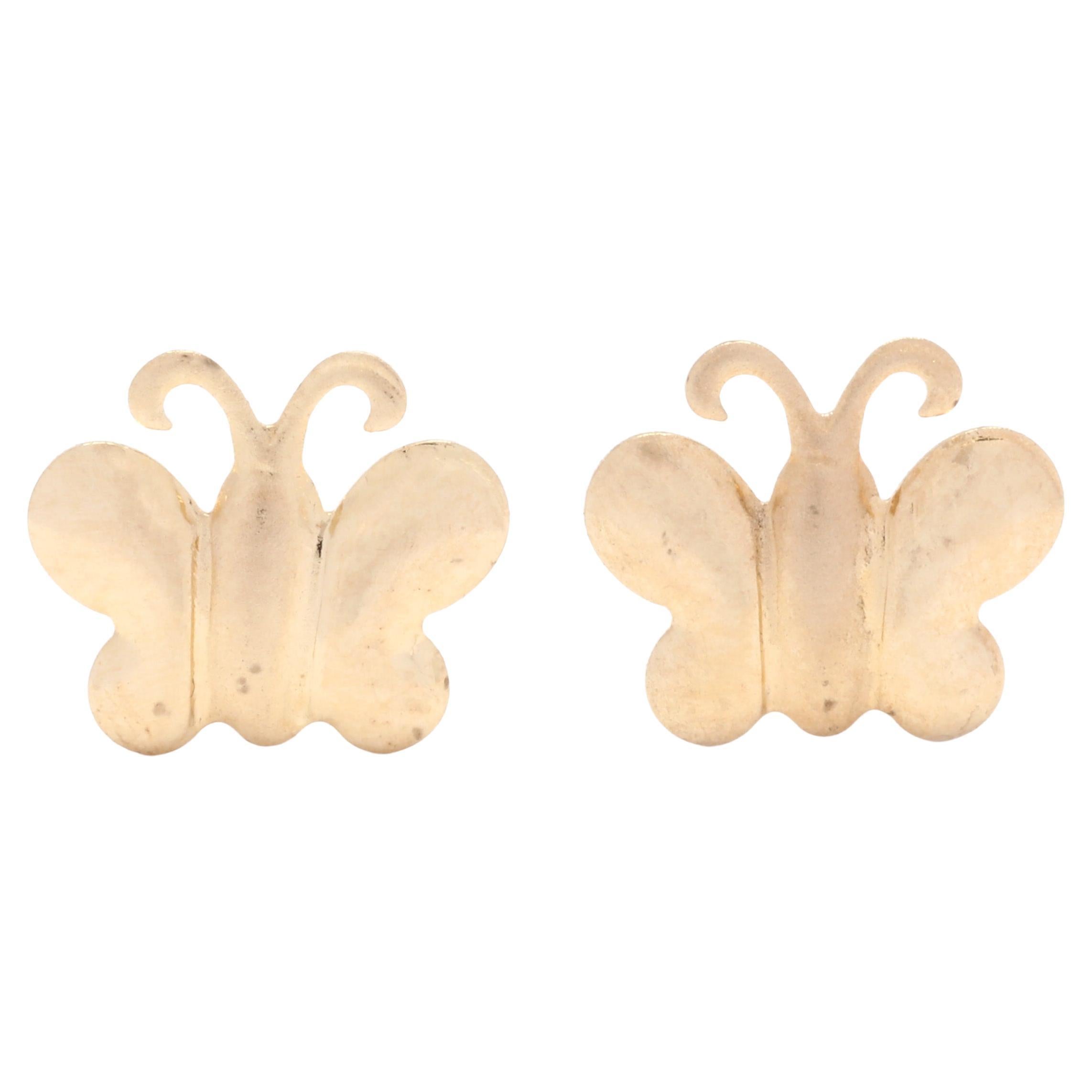 Petites clous d'oreilles papillon en or jaune 14 carats, longueur 1/4 pouce, légère  en vente