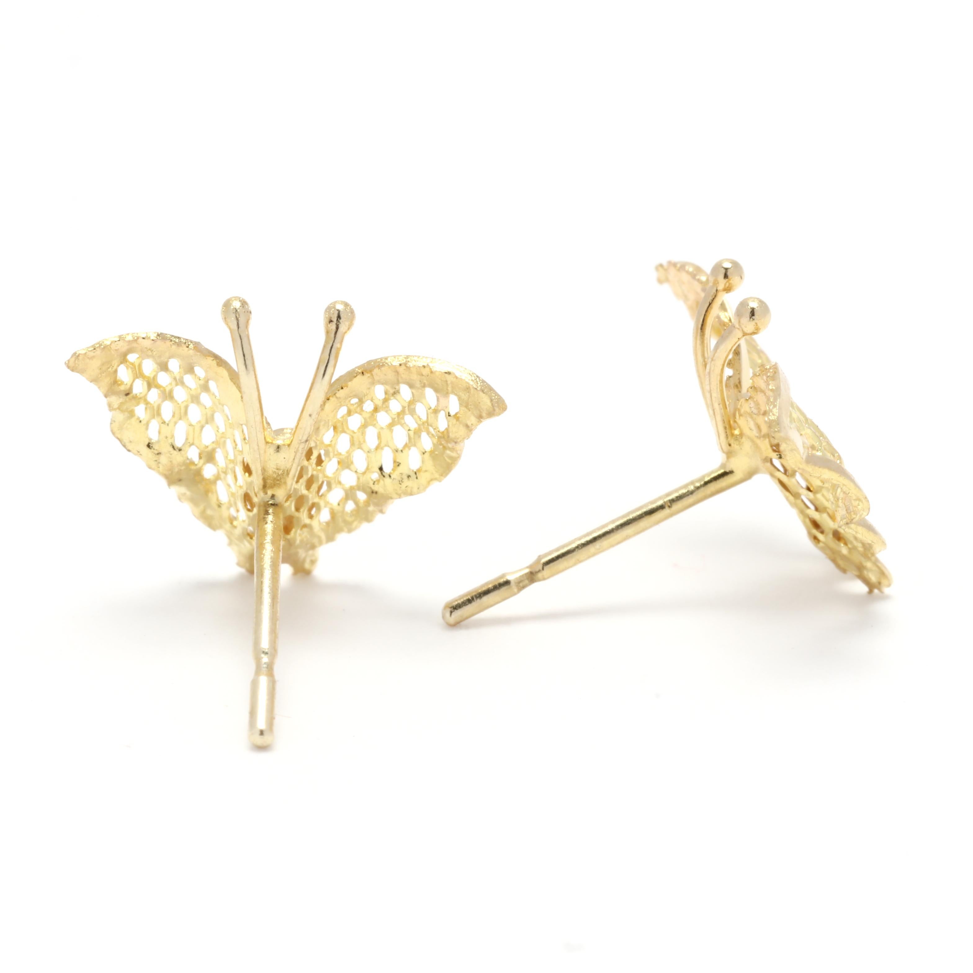 Add some feminine charm to your jewelry collection with these small gold butterfly stud earrings. Made from 14K yellow gold, these earrings are crafted with precision and attention to detail. The simple butterfly design adds a touch of whimsy and
