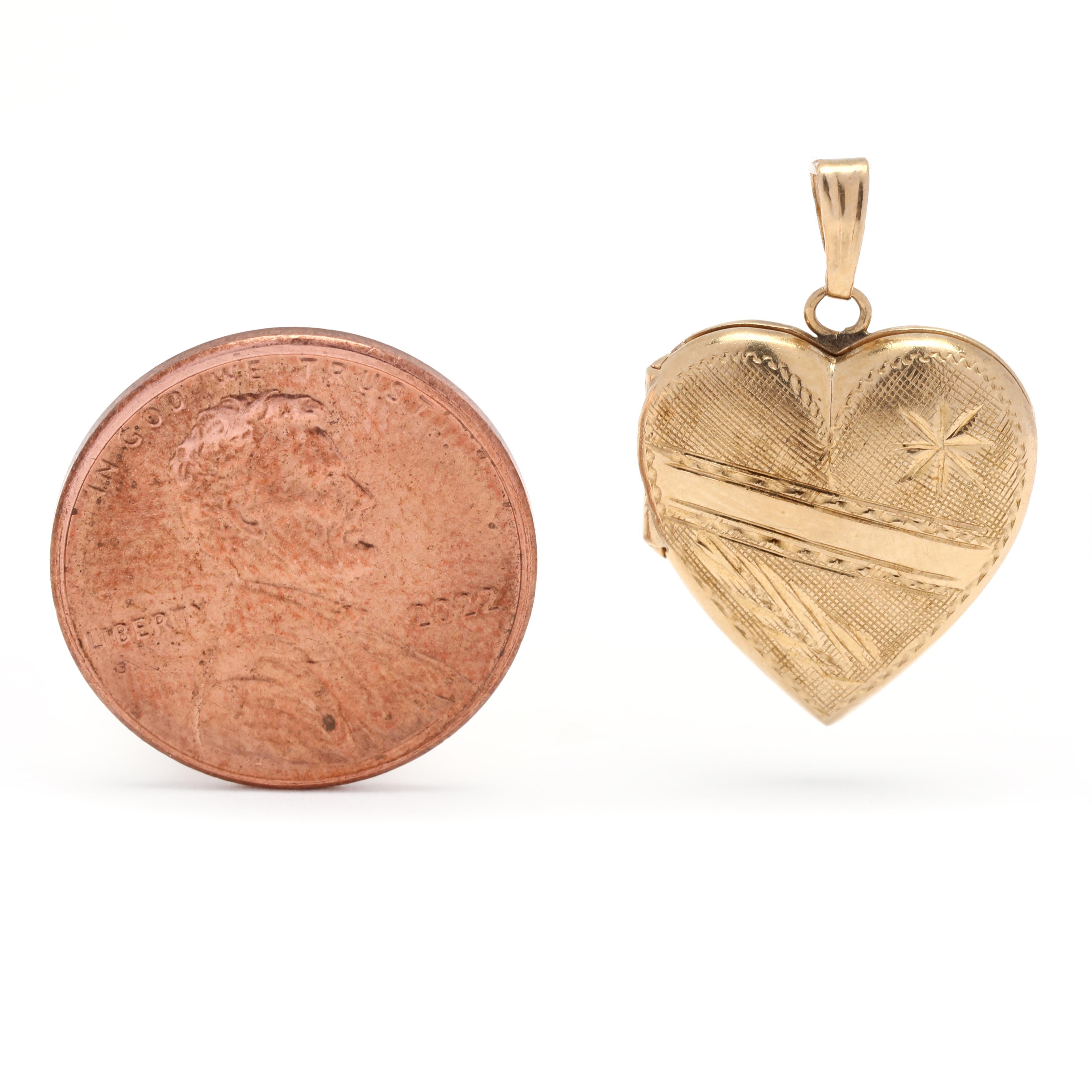 This exquisite 14K yellow gold locket pendant is the perfect way to express your love. Intricately engraved with a heart design, this small gold locket measures 7/8 inch in length. The simple, elegant style of this small gold locket makes it an