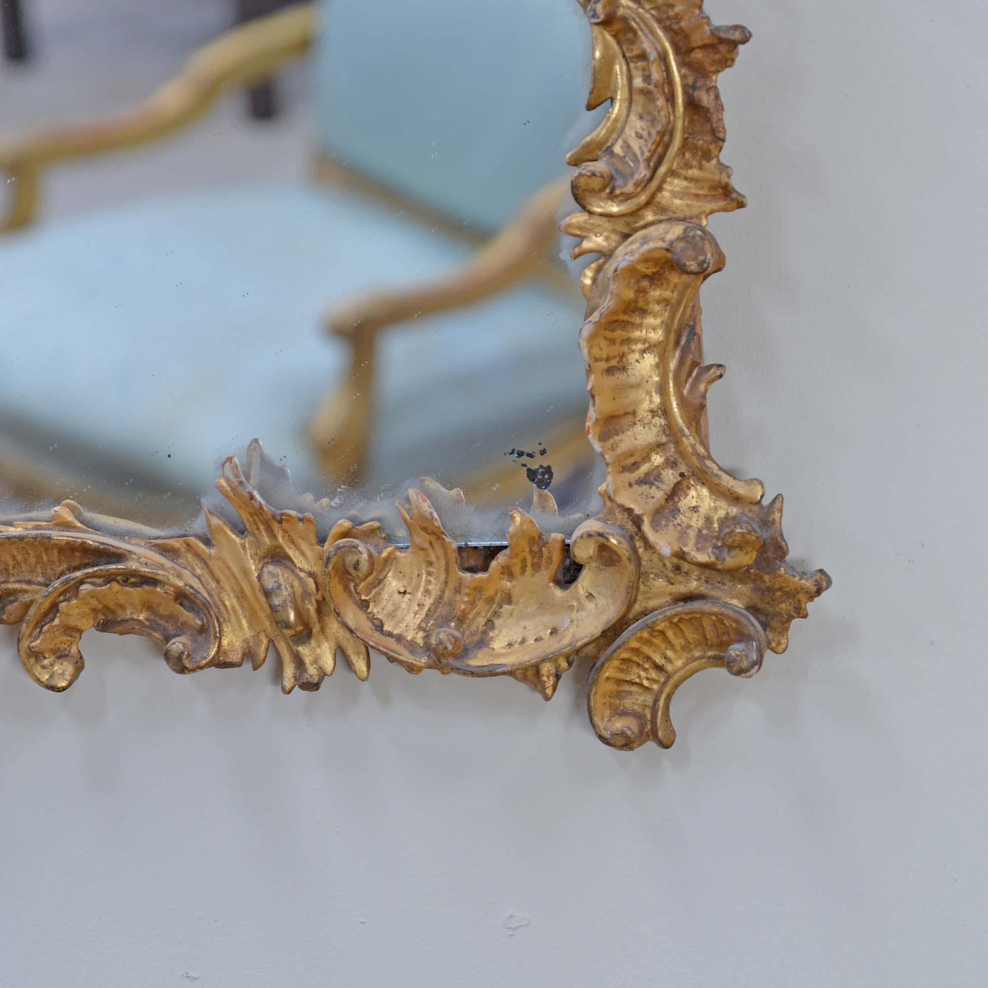 English Small gold Georgian carved giltwood hanging mirror