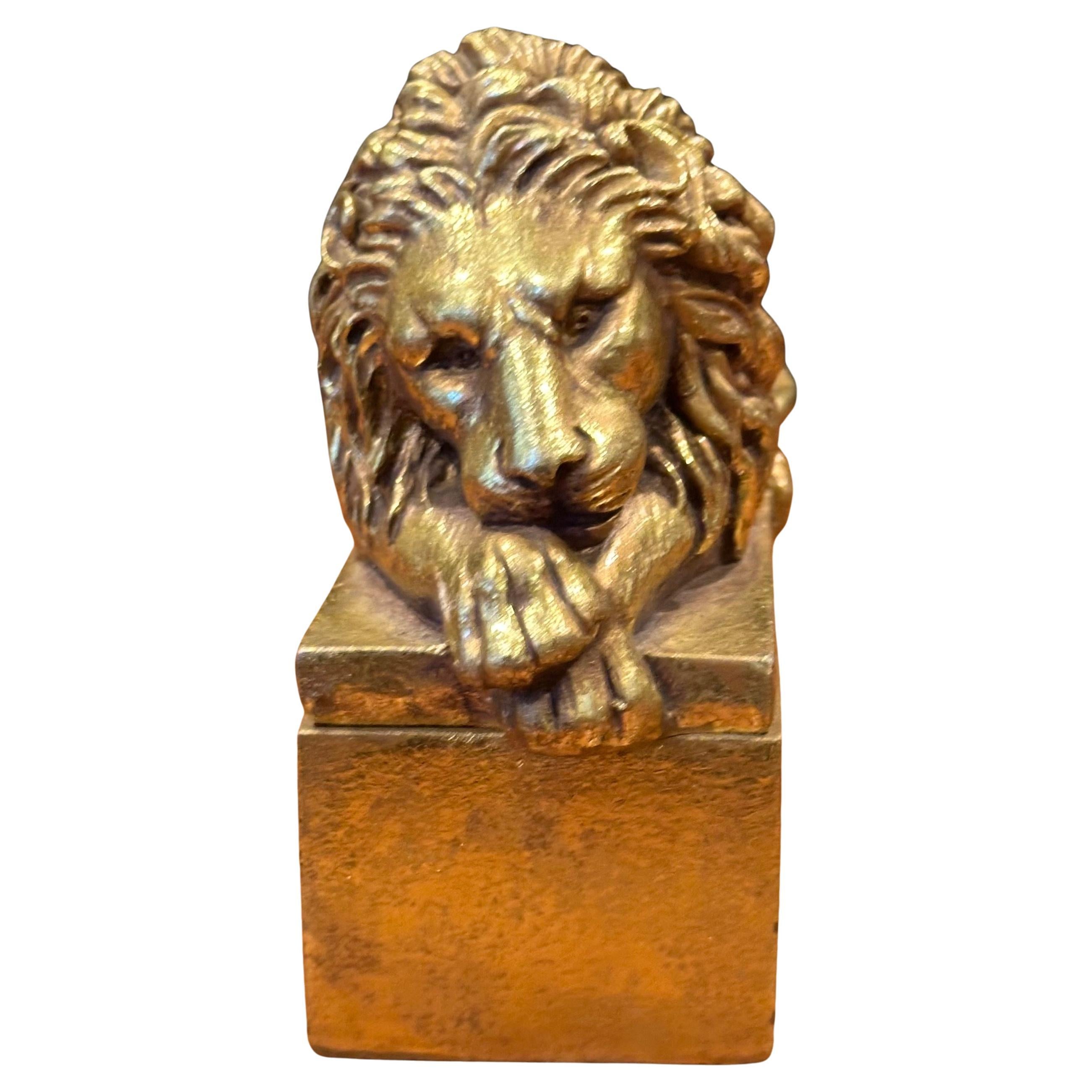 Small gold lion trinket box in the style of by Antonio Canova , circa 1970s.  The lion was originally sculpted by Antonio Canova (Italian, 1757-1822) in larger scale for the tomb of Pope Clement XIII in St. Peter’s Basilica. The Sleeping lion
