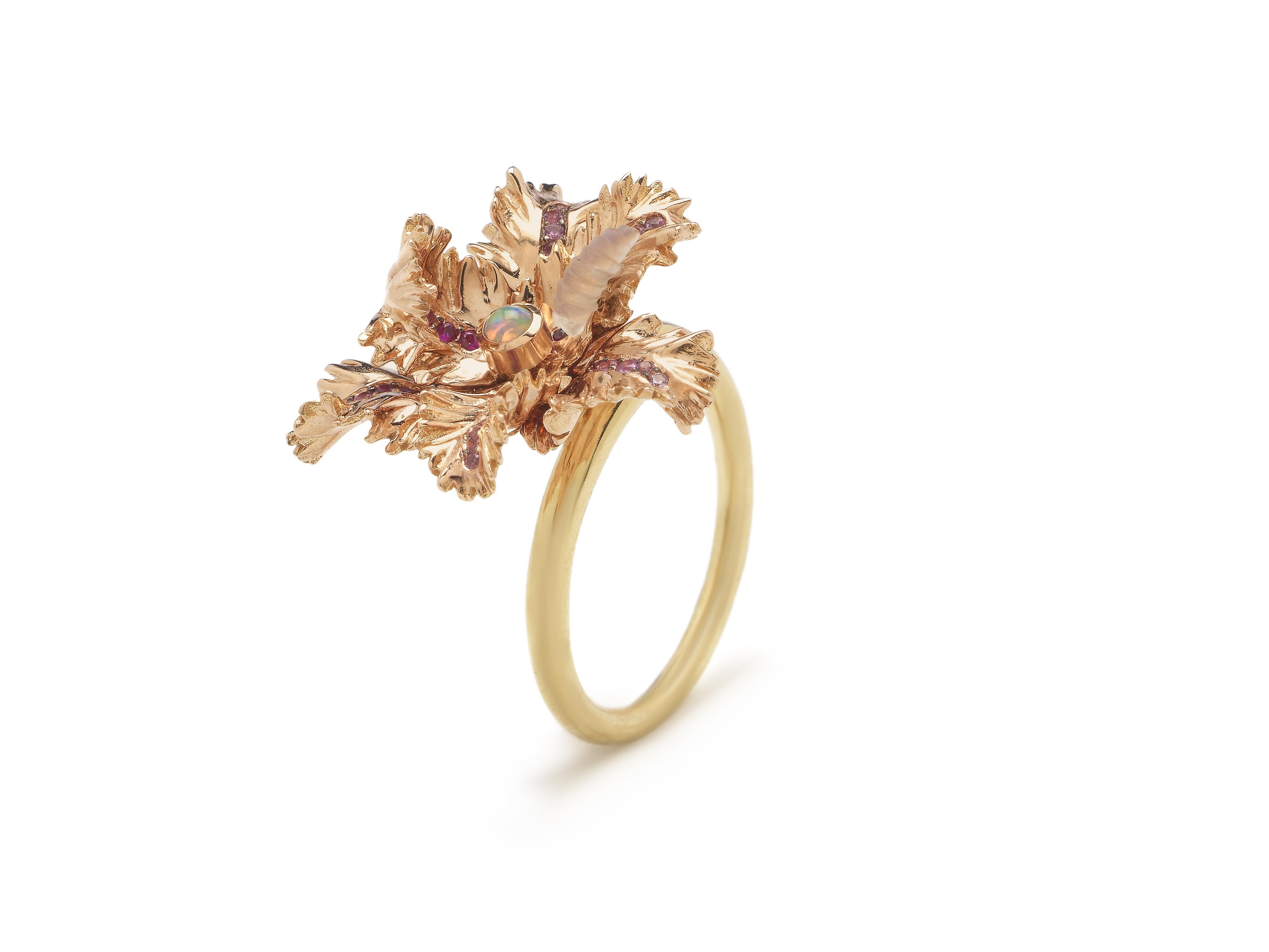 In the Small Tulip Ring Bibi captures the delicate form of a Parrot Tulip in a precious, sculptural ring. This statement cocktail ring is designed with 18k rose gold petals and an 18k yellow gold shank, with the shank fashioned as the tulip’s stem,