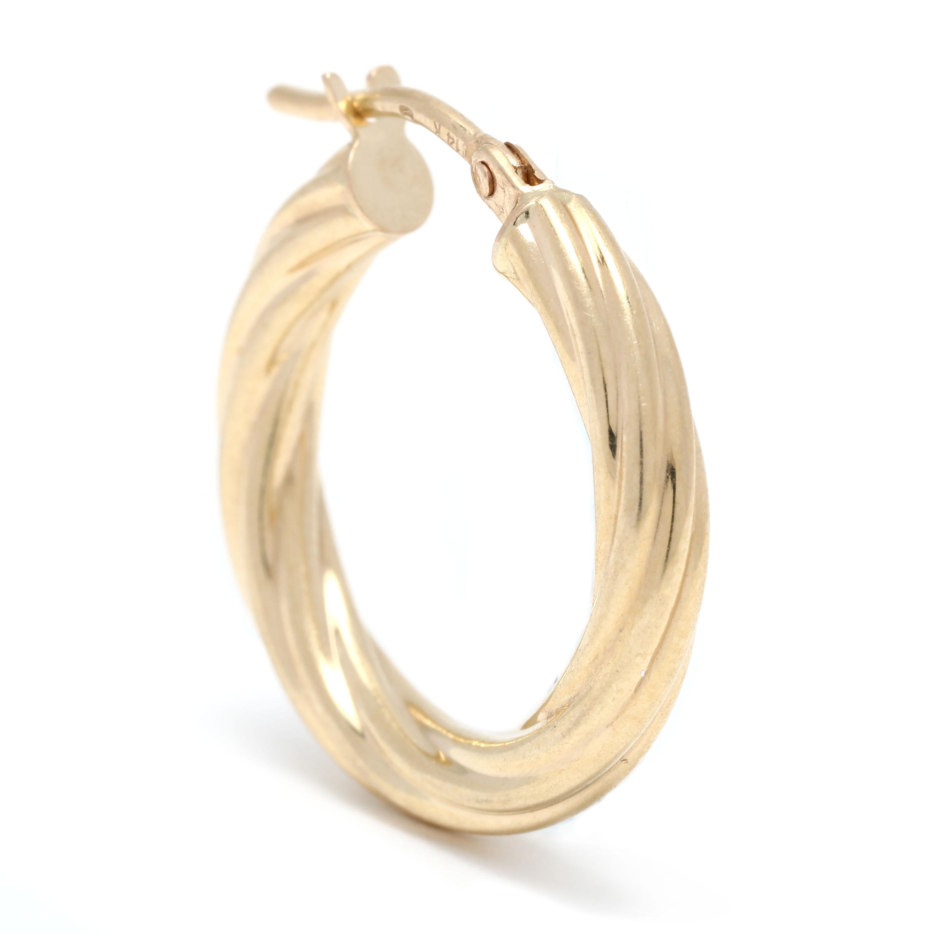 These small gold twist hoop earrings are perfect for everyday wear! Crafted in 14K yellow gold, these earrings feature a simple design with a beautiful twist. At a length of 3/4 inch, these earrings are small and dainty, making them the perfect