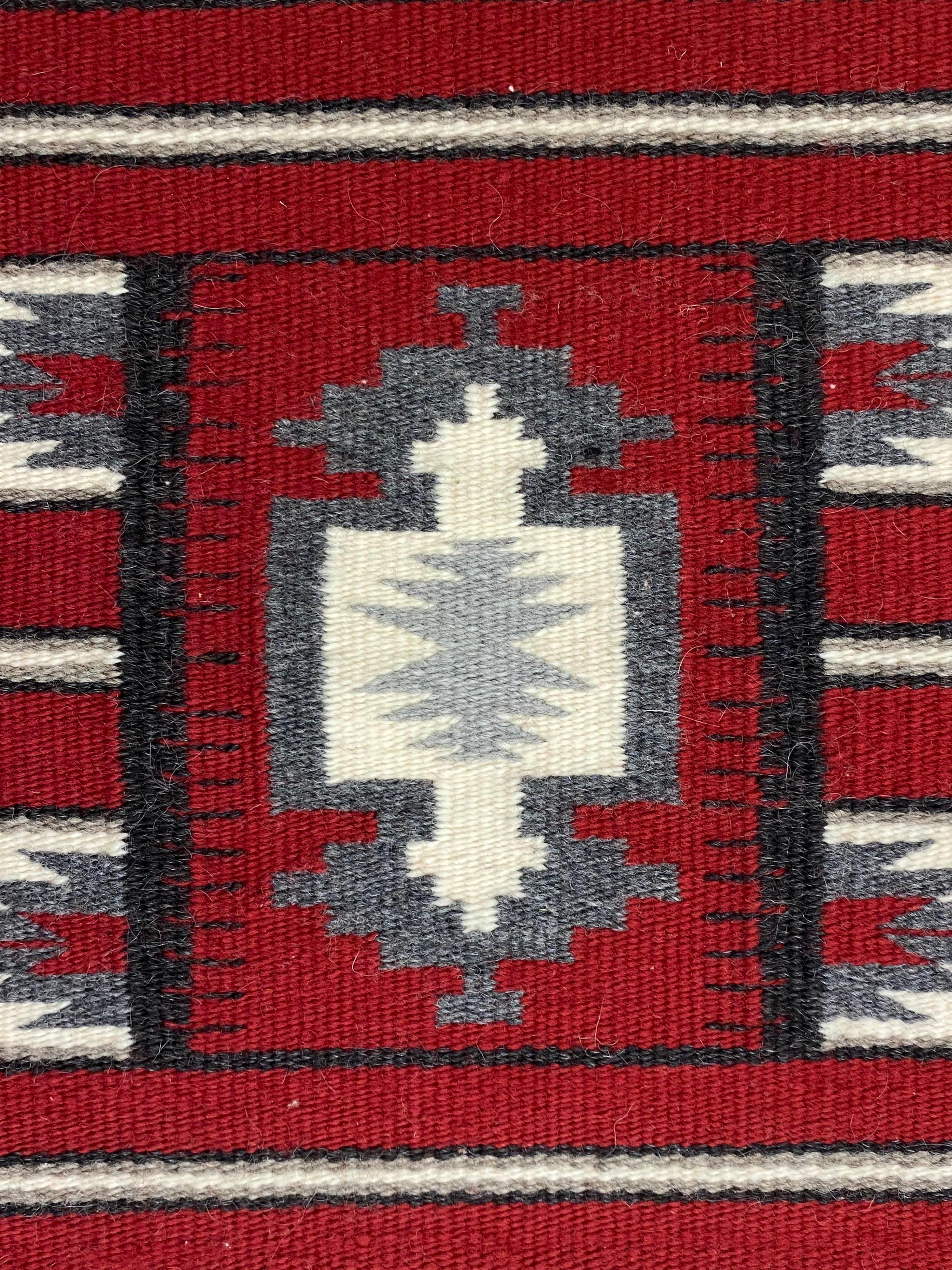 Small Ganado Red Rug by Mary James. Rug was purchased in 1997. Rug in very nice shape! Always hung on a wall and never walked on!.