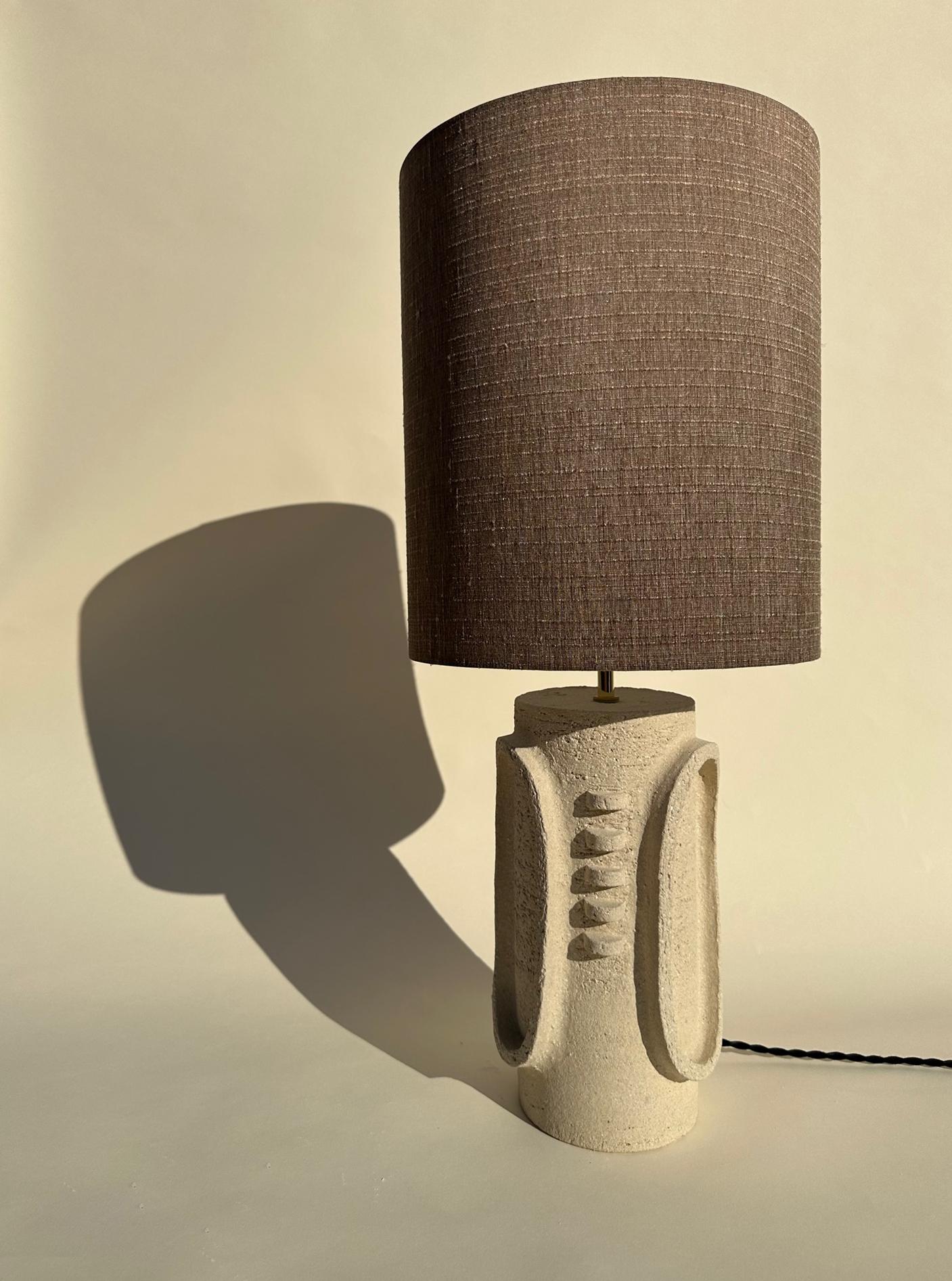 Small Graphic Table Lamp by Olivia Cognet
Dimensions: Base: D 20 x H 30 cm, Shade : 40 x 40 cm, Total Height: 70 cm. 
Materials: Ceramic.


Since moving to Los Angeles in 2016, French artist and designer Olivia Cognet has focused on ceramics as the