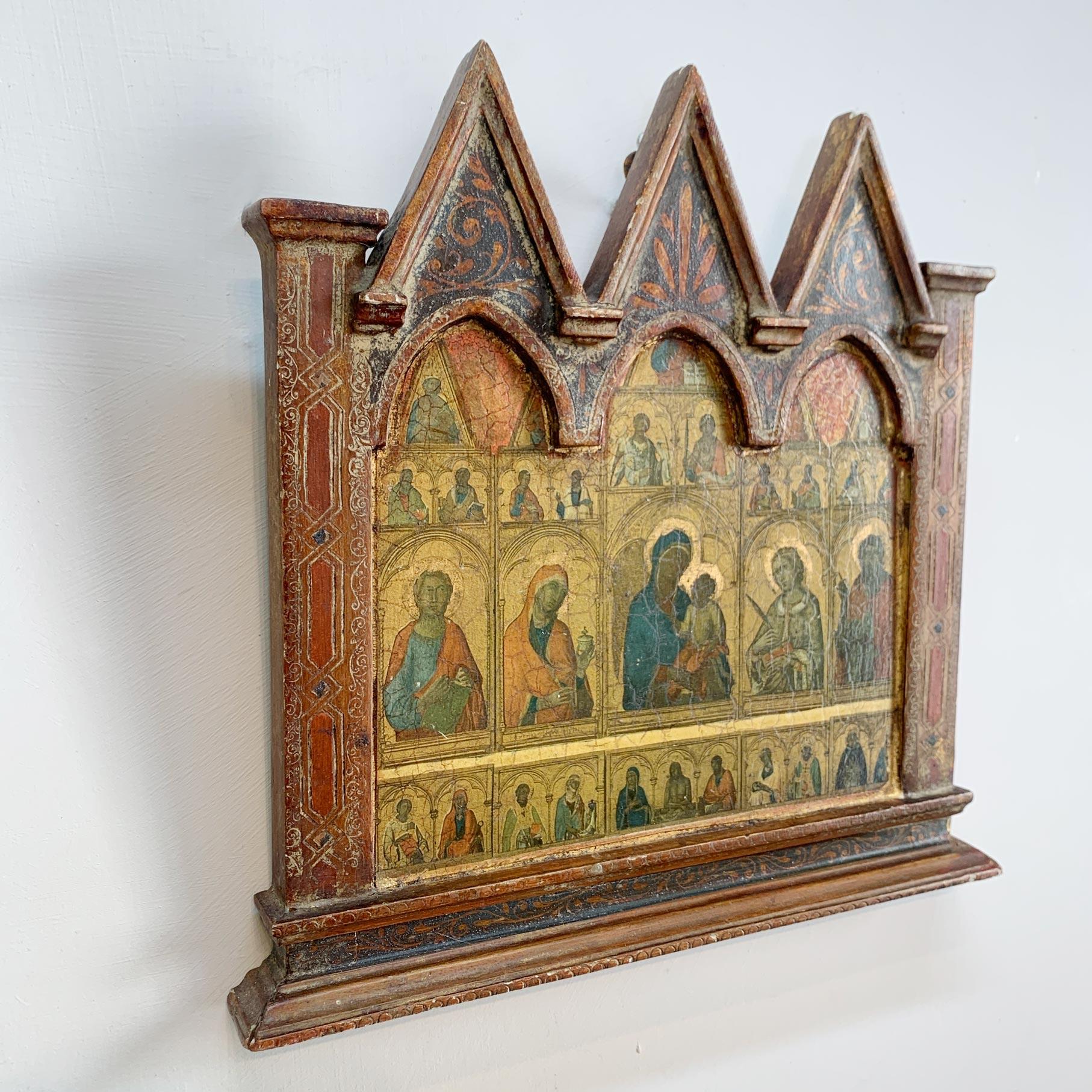 Late 19th century smaller scale Icon painting on wood, the arched, spired frame with applied gesso and gilt. The beautifully painted image is of The Virgin Mary, holding the infant Jesus, surrounded by Saints.

We believe this is a Greek Orthodox