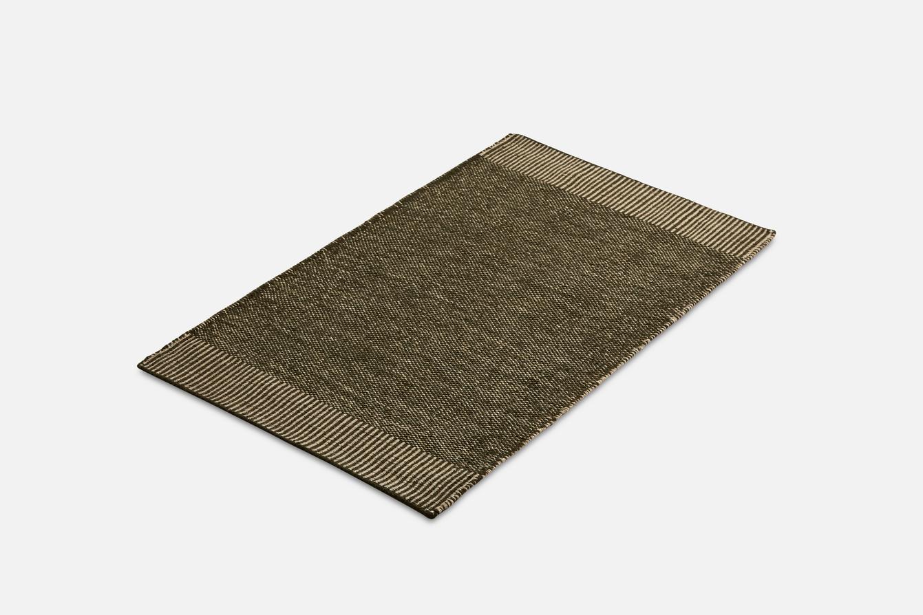 Small Green Rombo rug by Studio MLR
Materials: 65% wool, 35% jute.
Dimensions: W 90 x L 140 cm
Available in 3 sizes: W90 x L140, W170 x L240, W75 x L200 cm.
Available in grey, moss green and rust.

Rombo is characterised by the materials used