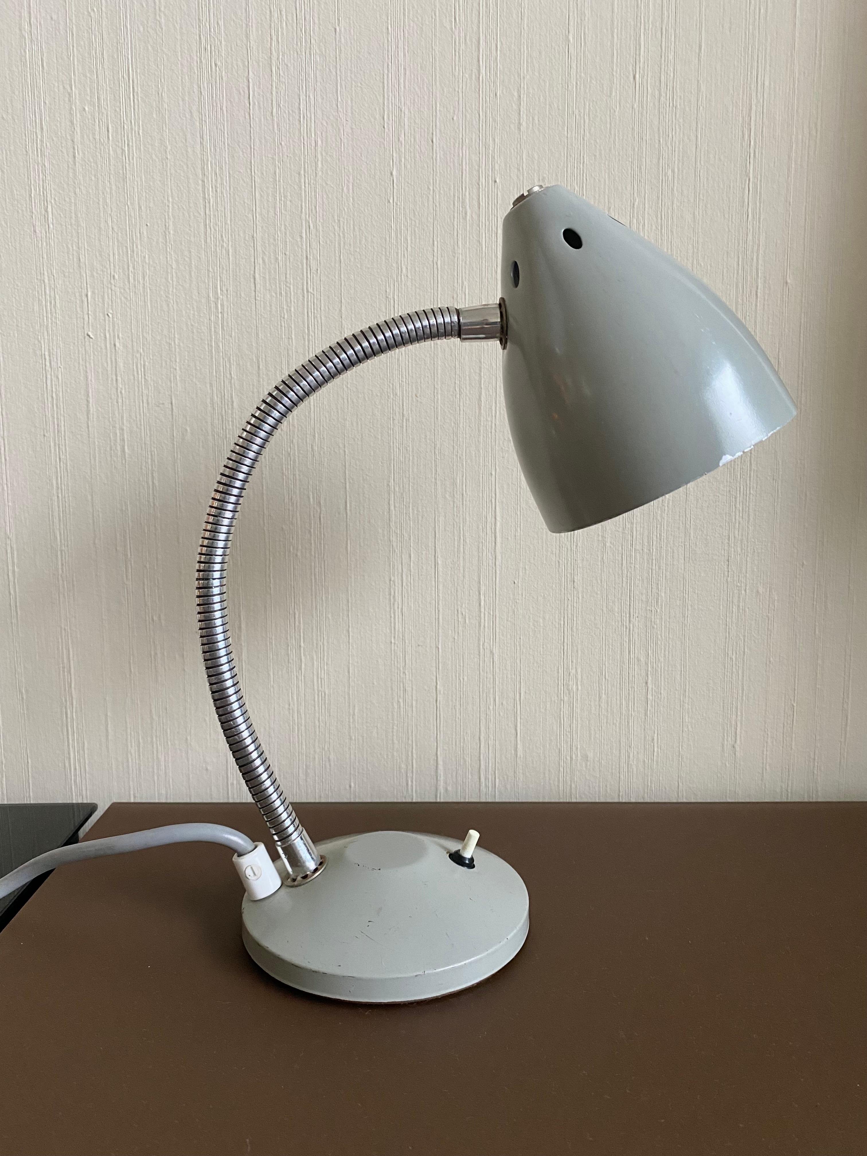 Small desk lamp or reading lamp, designed by Herman Theodoor Busquet for Hala Zeist ca. the 1960s. This cute little lamp was called ‘Ukkie’, a term which is also used in Holland for children. This piece remains in wonderful condition with minimal