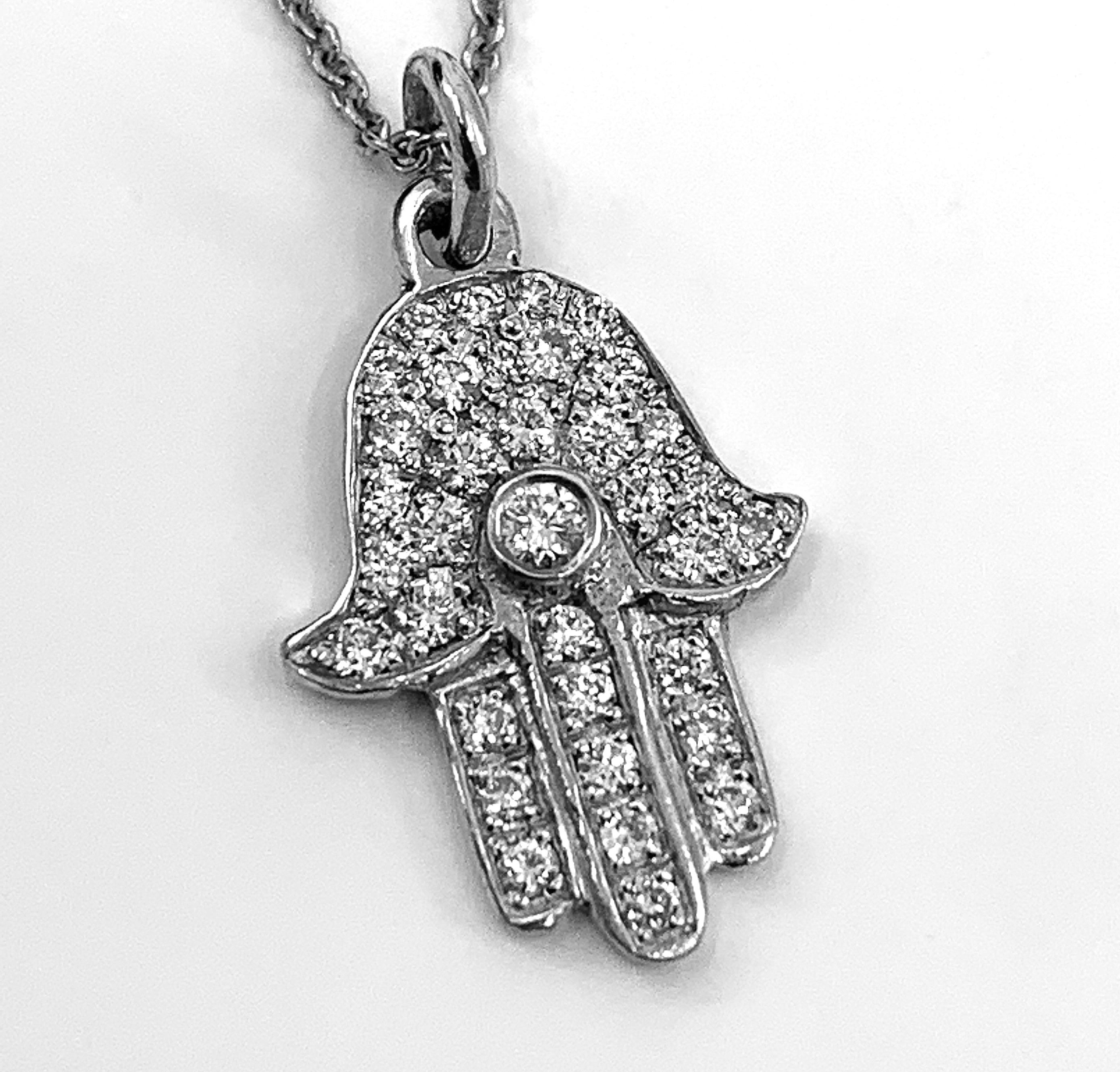 The hamsa is a nearly universal symbol of luck, good health, and happy fortunes.   Eytan Brandes has designed dozens of different hamsa pendants, pins, and even rings in his forty years, but this is probably his most popular  -- the perfect gift for