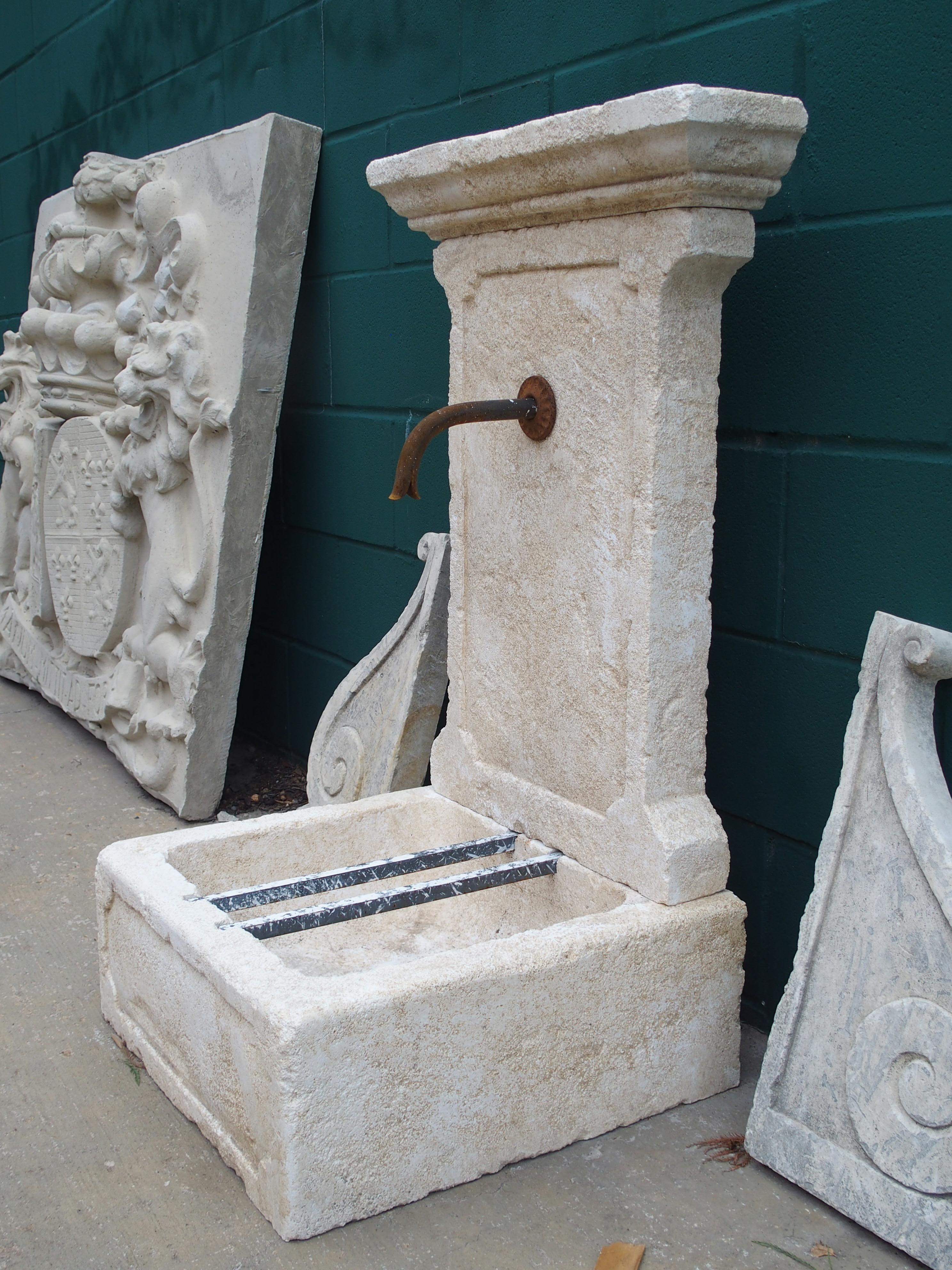Contemporary Small Hand Carved Limestone Wall Fountain from Provence, France, 37 1/2 Inches H For Sale