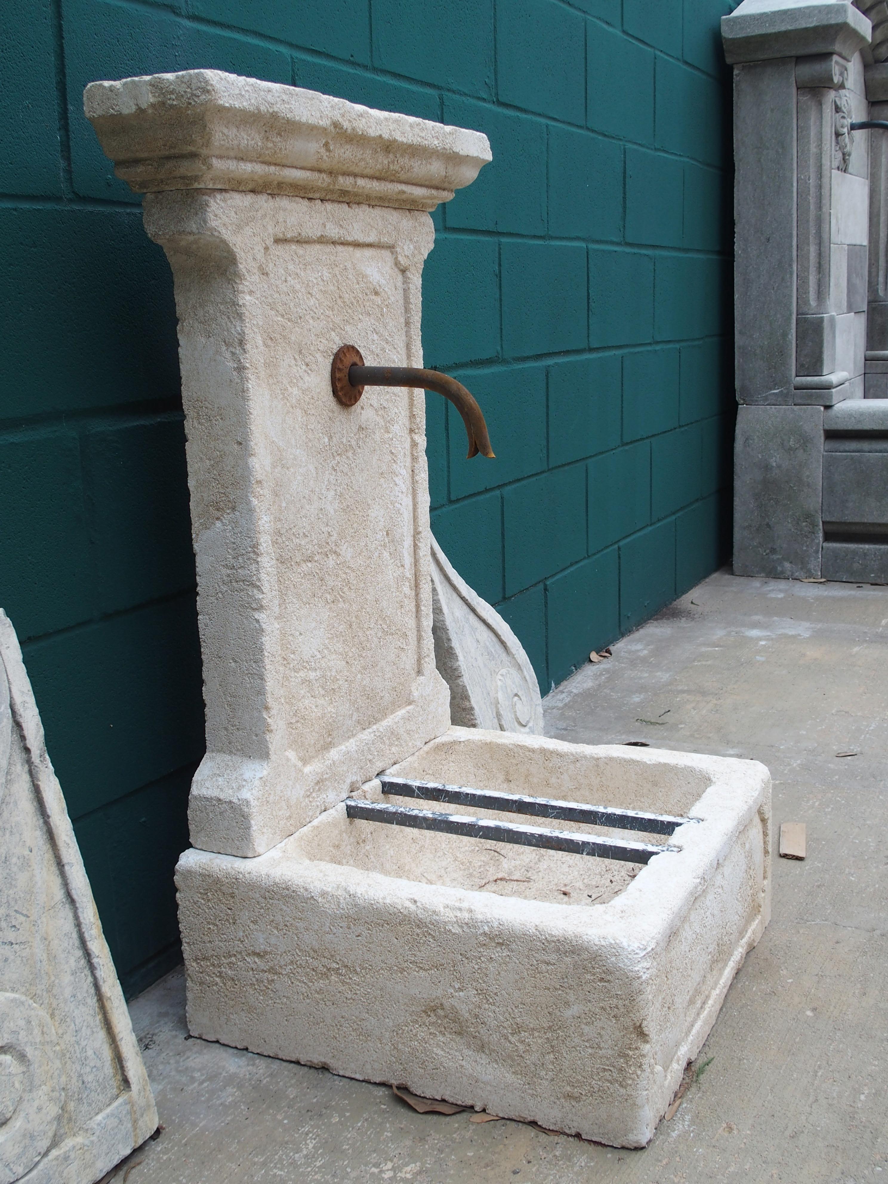 Metal Small Hand Carved Limestone Wall Fountain from Provence, France, 37 1/2 Inches H For Sale