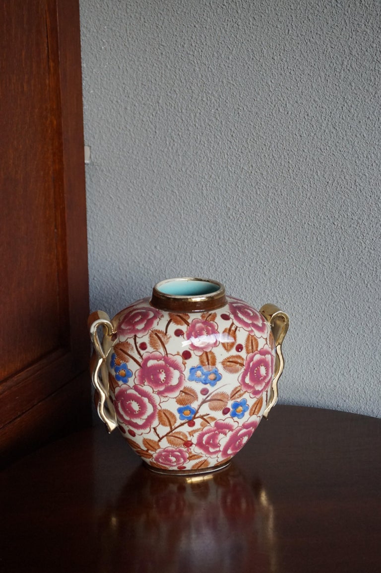 Yet another bargain for Art Deco and for fine pottery enthousiasts.

If you are an Art Deco enthousiast then this exceptional little vase by Raymond Chevalier will bring light and beauty in your life. The colors and the hand-painted decor are