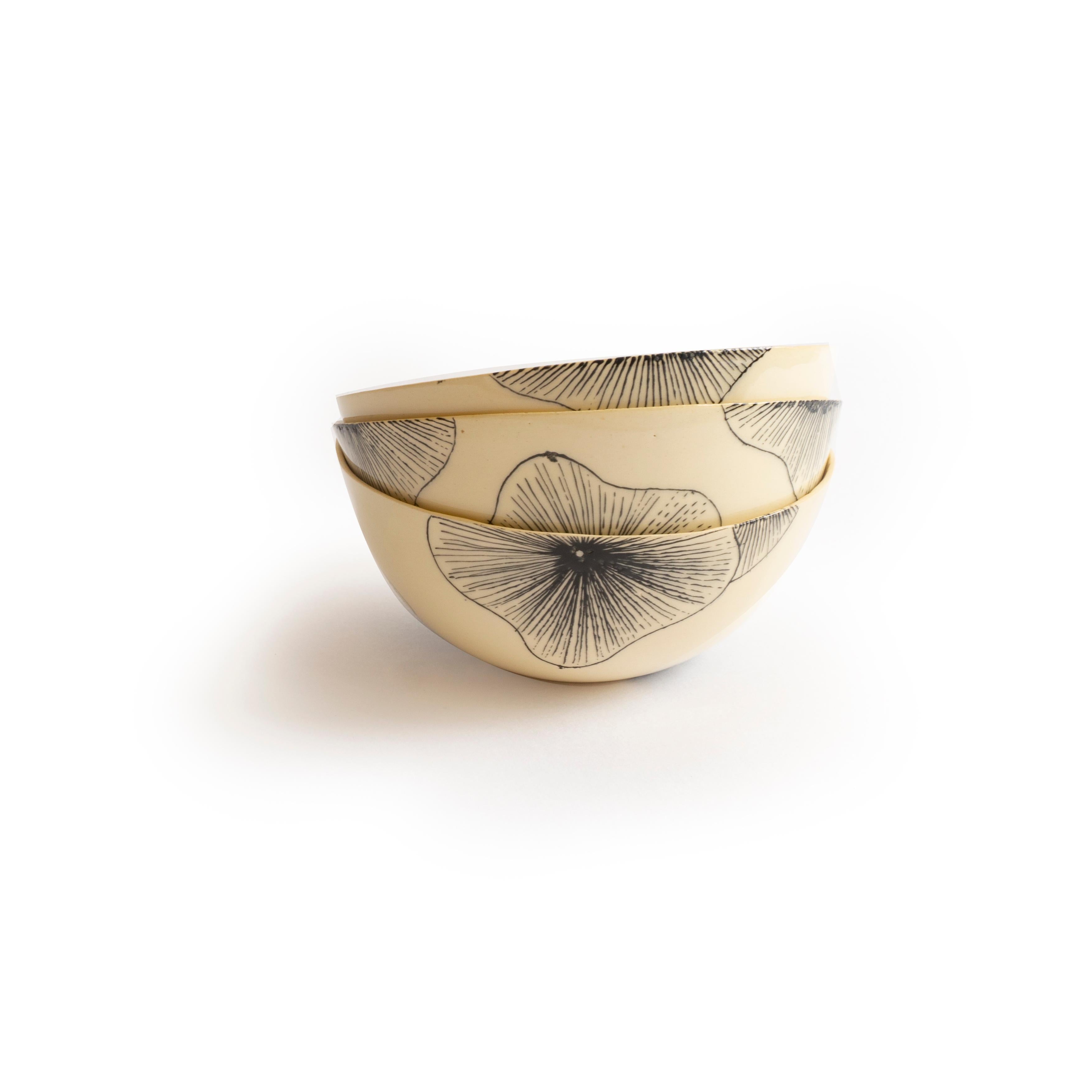 These handcrafted ceramic bowls from Paris are completely hand made. From the hand beating of the clay to the drawn illustration each plate is meticulously crafted. These bowls are made from natural clay resulting in slightly different hues from one