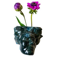 Small handmade ceramic vase or flower pot in turquoise-black in stock 