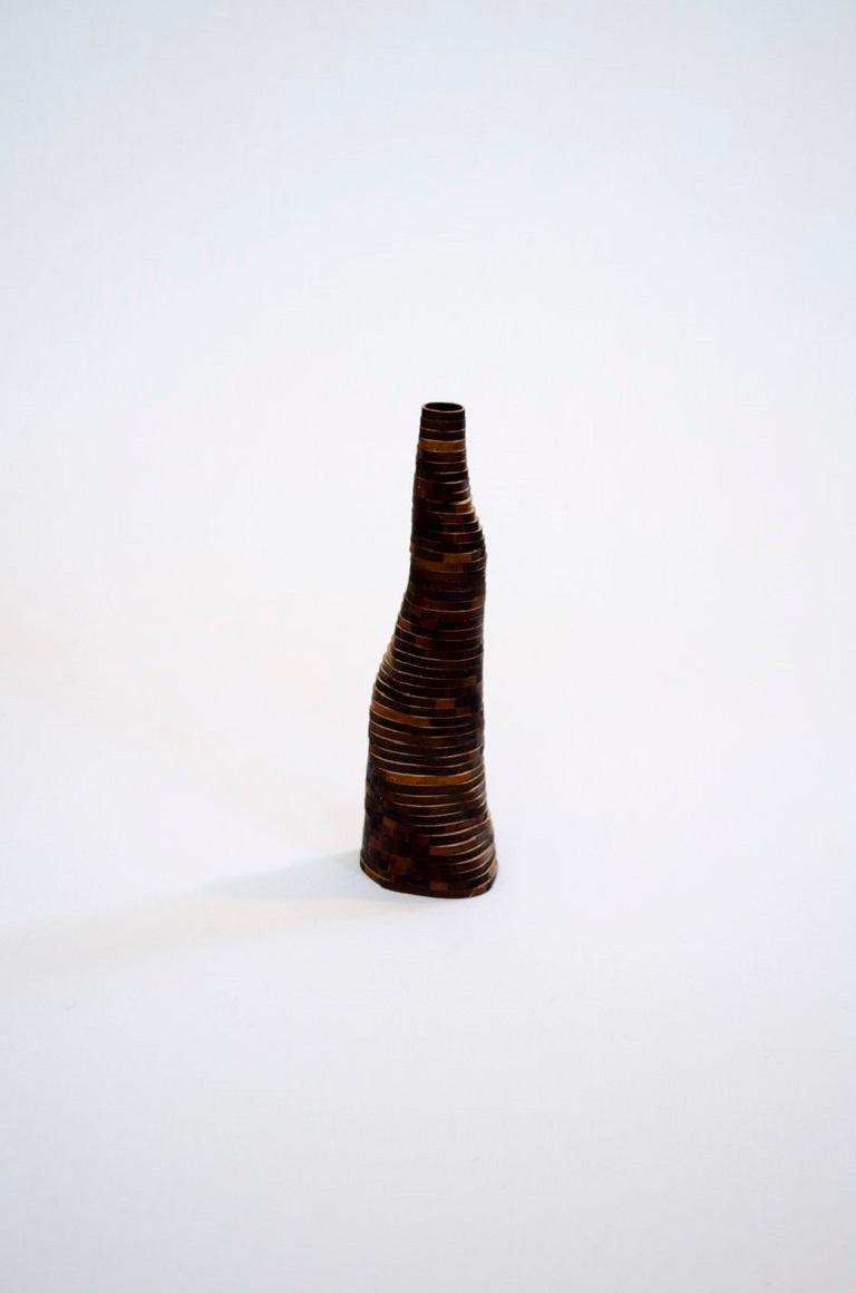 Small Handmade Stratum Tempus Burned Bamboo Vase by Daan De Wit
Numbered Edition
Dimensions: D 5 x H 17 cm.
Materials: Bamboo.
Also available in other sizes.

Inspired by flowers, made for flowers.
Each piece is spirally hand-assembled. For this