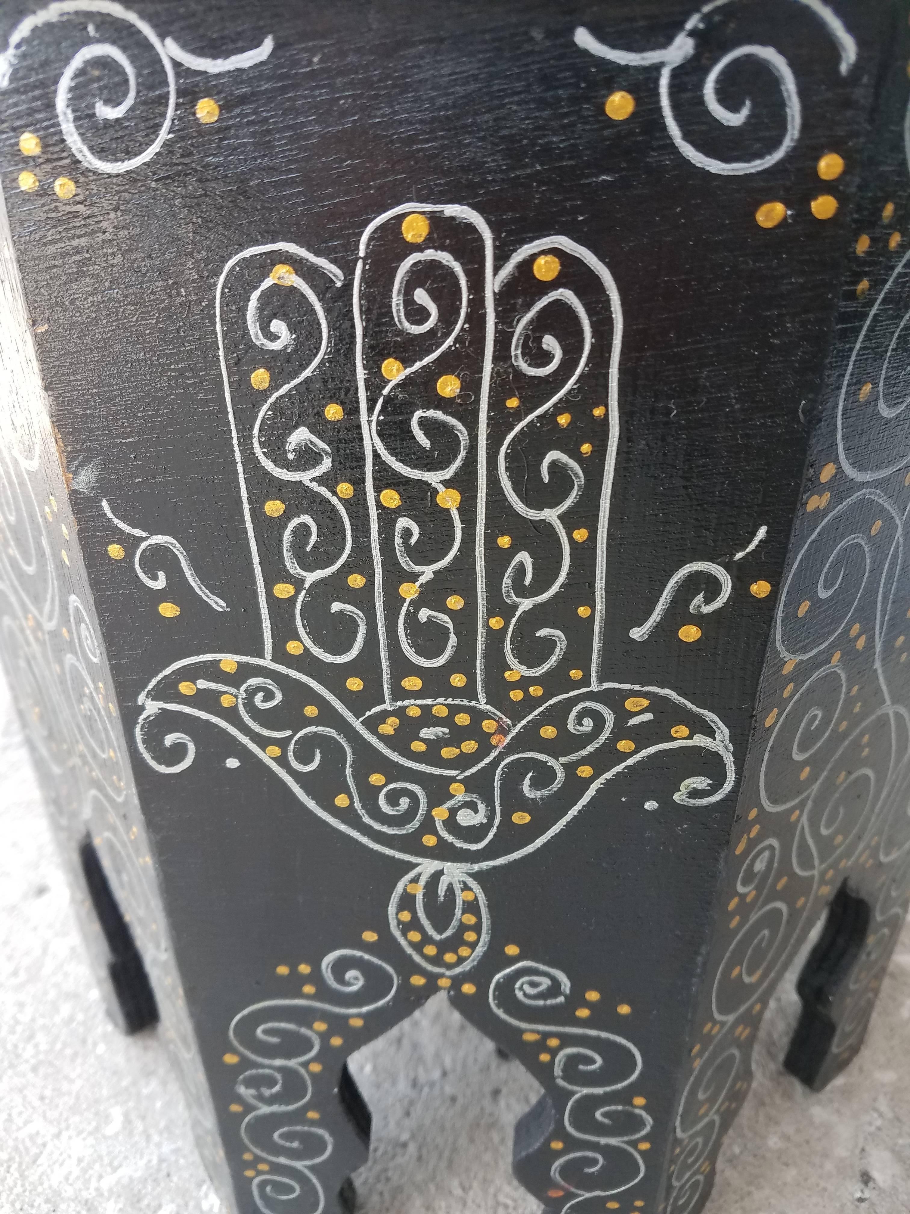 Rare find! 100% hand-painted Moroccan hexagonal shape side table. Black color with silver design. Great handcraftsmanship throughout. Beautiful add-on to your decor. This table measures approximately 14