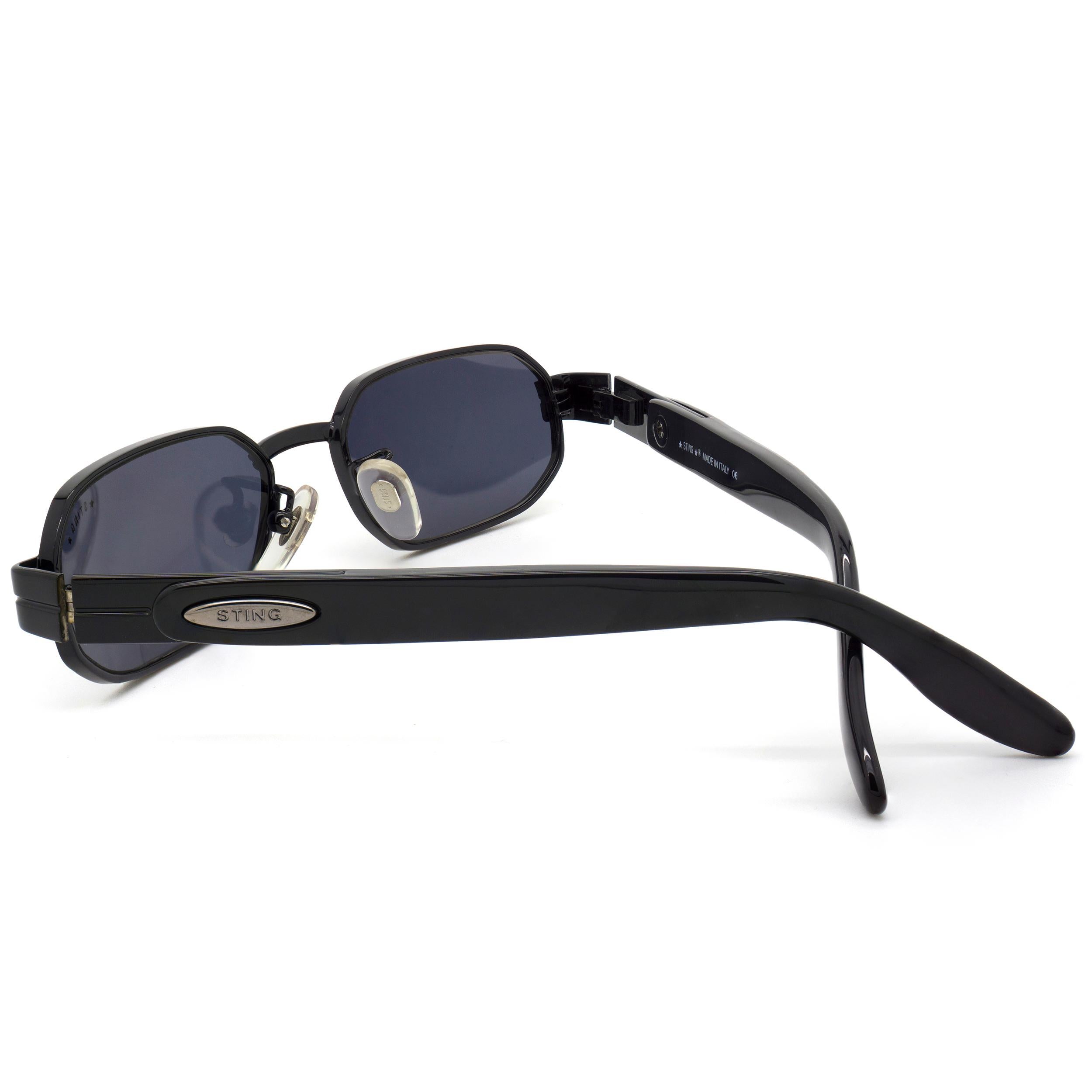 Noir Petites lunettes de soleil hexagonales par Sting, Italie  en vente