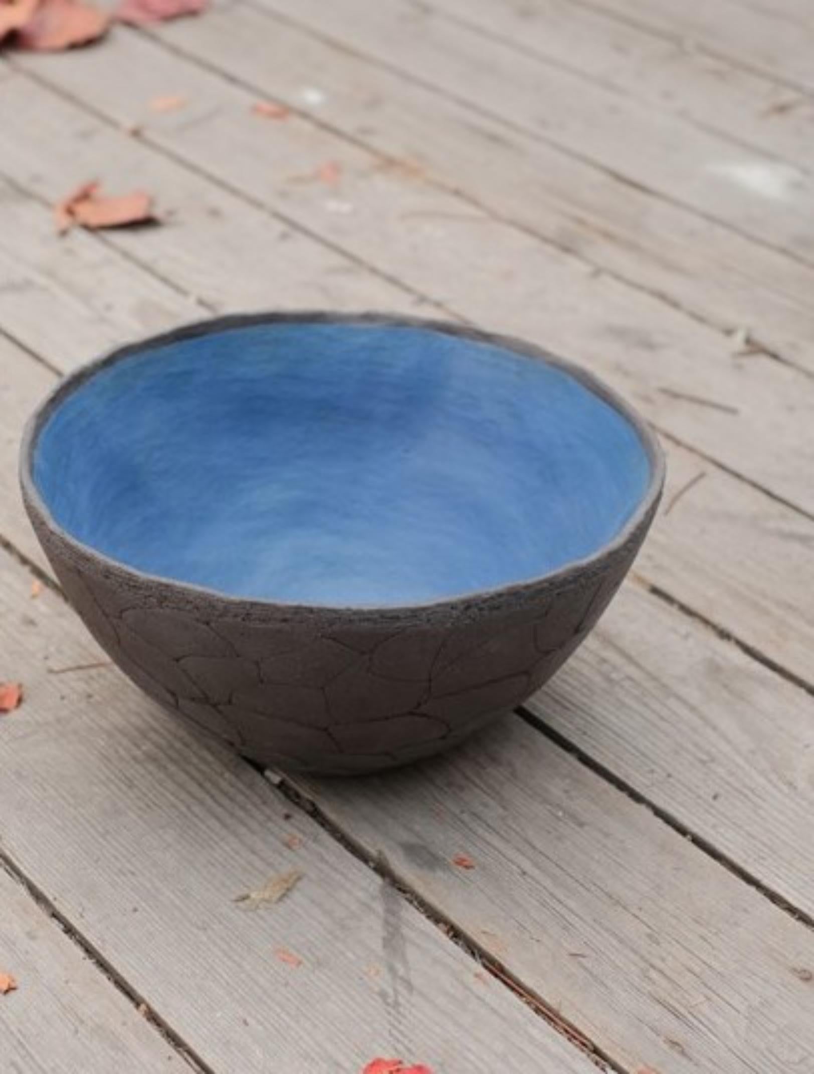 Small, low bowl by Atelier Ledure
Dimensions: D 27 x H 13 cm
Materials: Ceramics - stoneware
Also Available: Other variations available.

A Protest Against Polished Stoneware
The BOWLS are the result and expression of a series of experiments with
