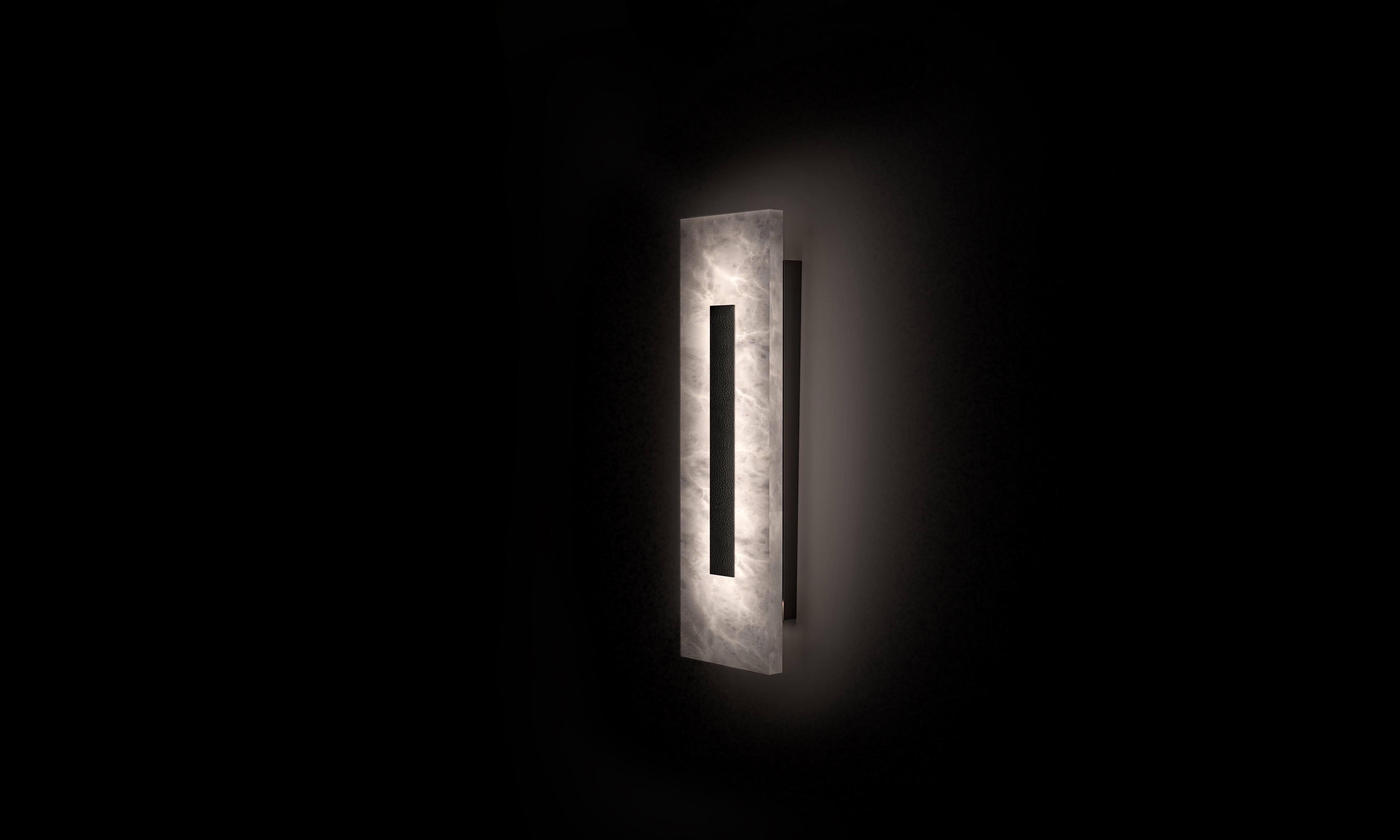 Small Himeji Wall Lamp by Alabastro Italiano
Dimensions: D 9 x W 15 x H 50 cm.
Materials: White alabaster, brushed black metal.
Available in other finishes and sizes.

2 x Strip LED
21.6 W/m

All our lamps can be wired according to each country. If