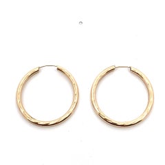 Small hoop huggie earrings yellow gold