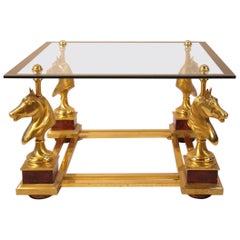 Maison Charles, Small horse coffee table in gilt bronze, 1970’s