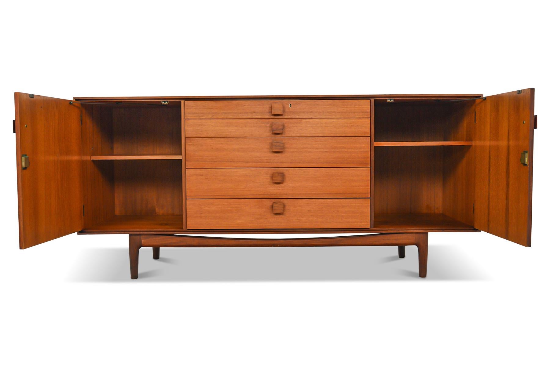 Origin: England
Designer: Ib Kofod Larsen
Manufacturer: G Plan
Era: 1961
Materials: Teak, Rosewood, Afromosia
Measurements: 66? wide x 19? deep x 30? tall

Condition: In good original condition with cosmetic wear (will be addressed in