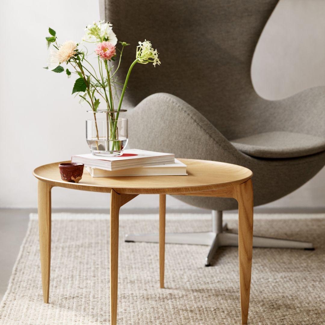 Small 'Ikebana' vase in mouth-blown glass and brass for Fritz Hansen.

Established in 1872, Fritz Hansen has become synonymous with legendary Danish design. Combining timeless craftsmanship with an emphasis on sustainability, the brand’s re-editions