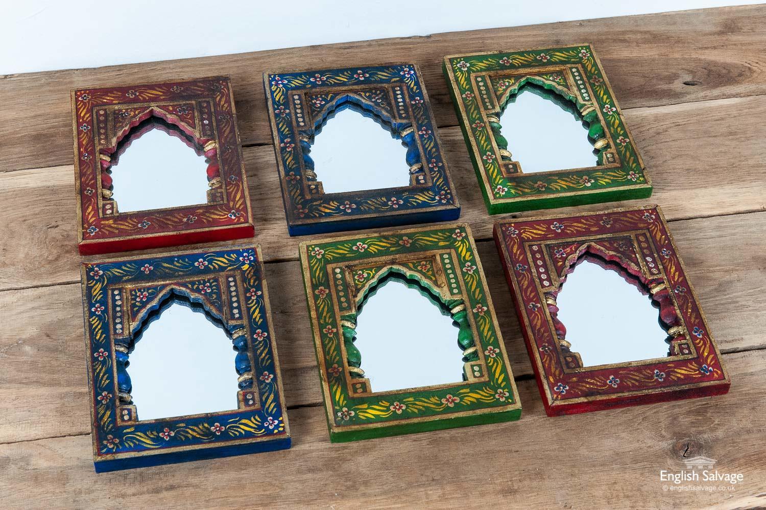 Colorful hardwood Indian mirrors. Nicely shaped frames, intricately painted with floral and gilt accents. Fixing rings to the back which are 1cm high. Being hand painted, original items no two will be the same. We have at least two of each color