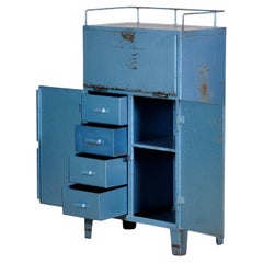 Piccolo mobile industriale in ferro con quattro cassetti, anni '70