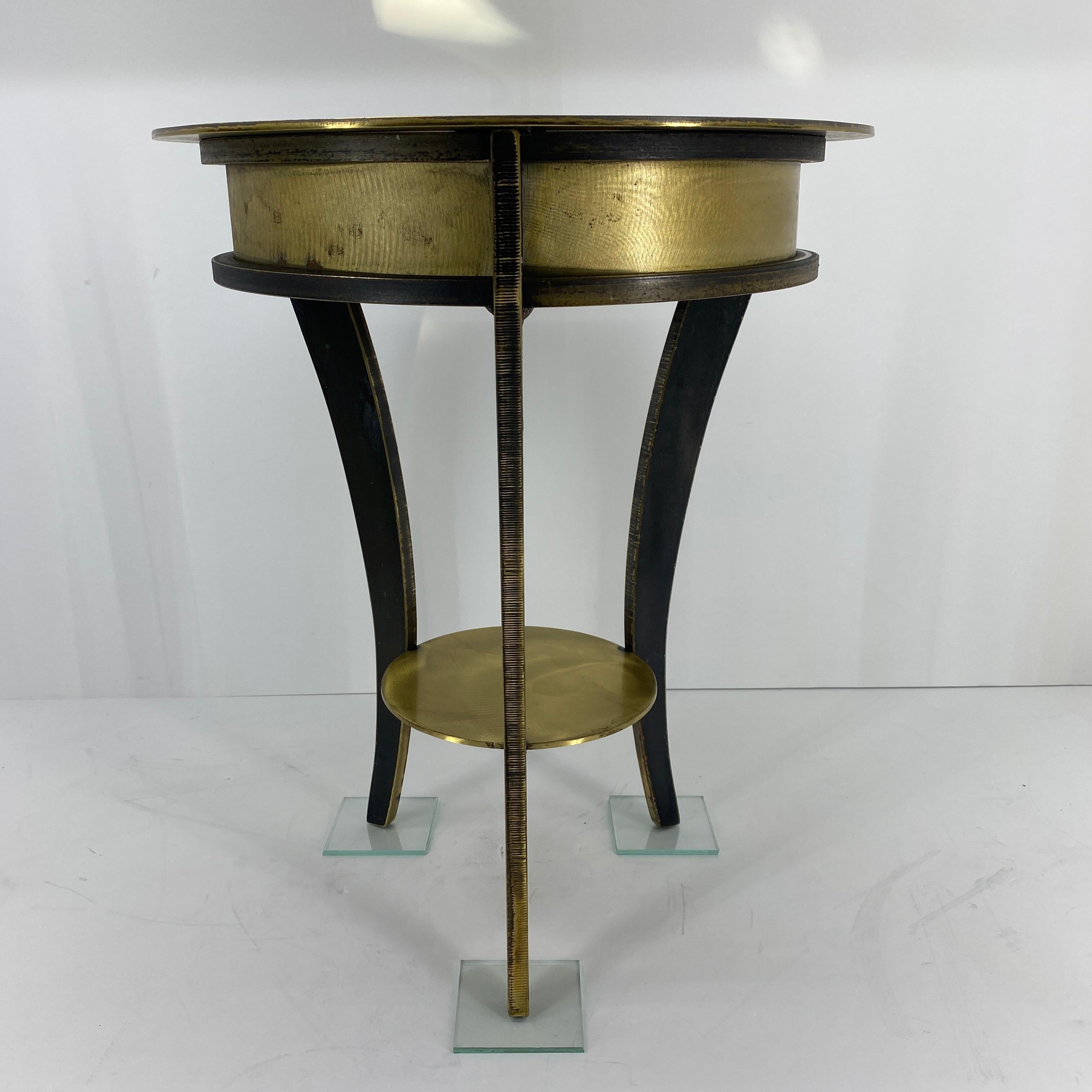 Small Industrial John Visey style solid brass end table.