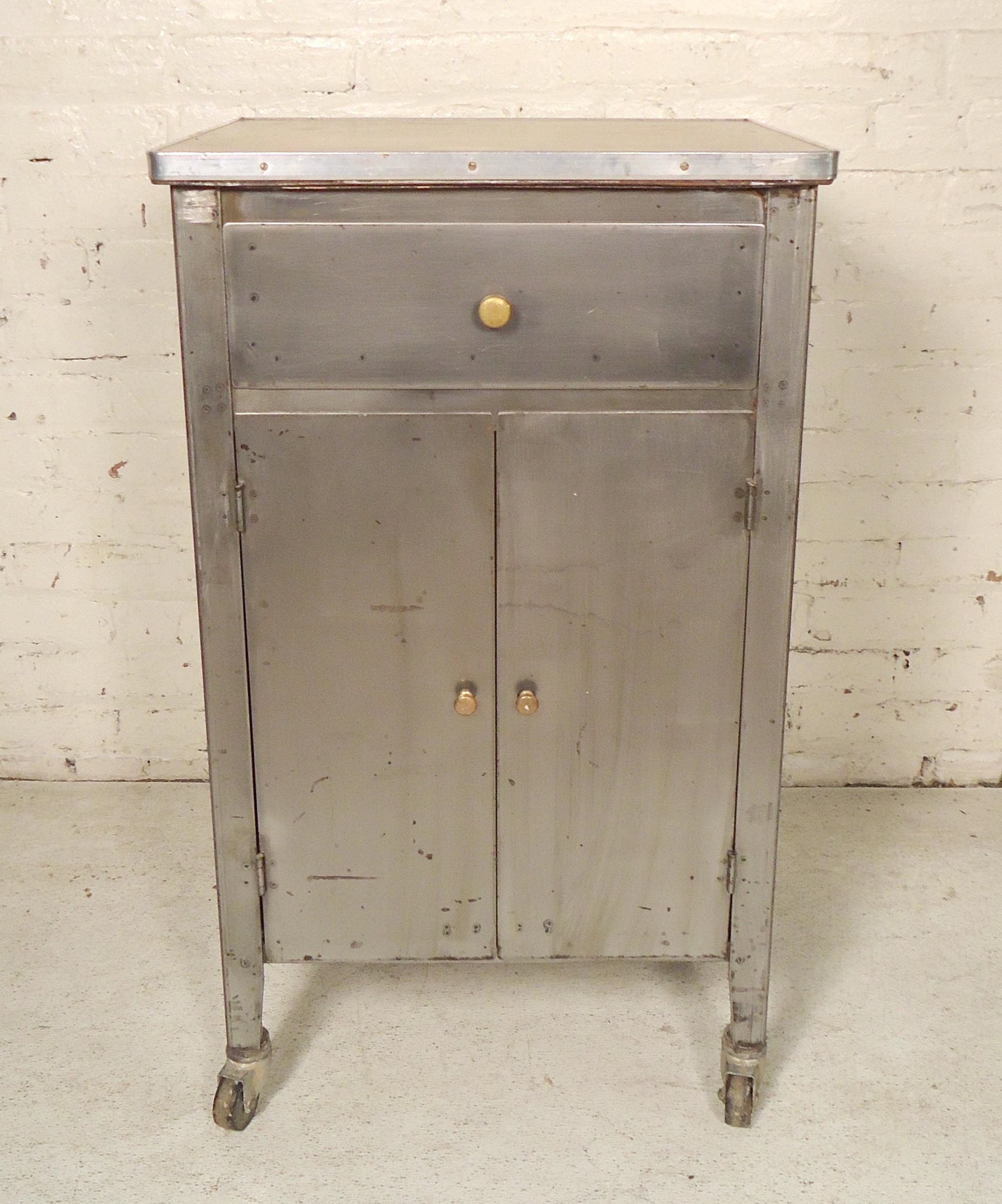 Factory cabinet restored for modern home use in kitchen or bathroom. Bare metal style finish with brass knobs, drawer and two door cabinet storage.

(Please confirm item location - NY or NJ - with dealer).
   