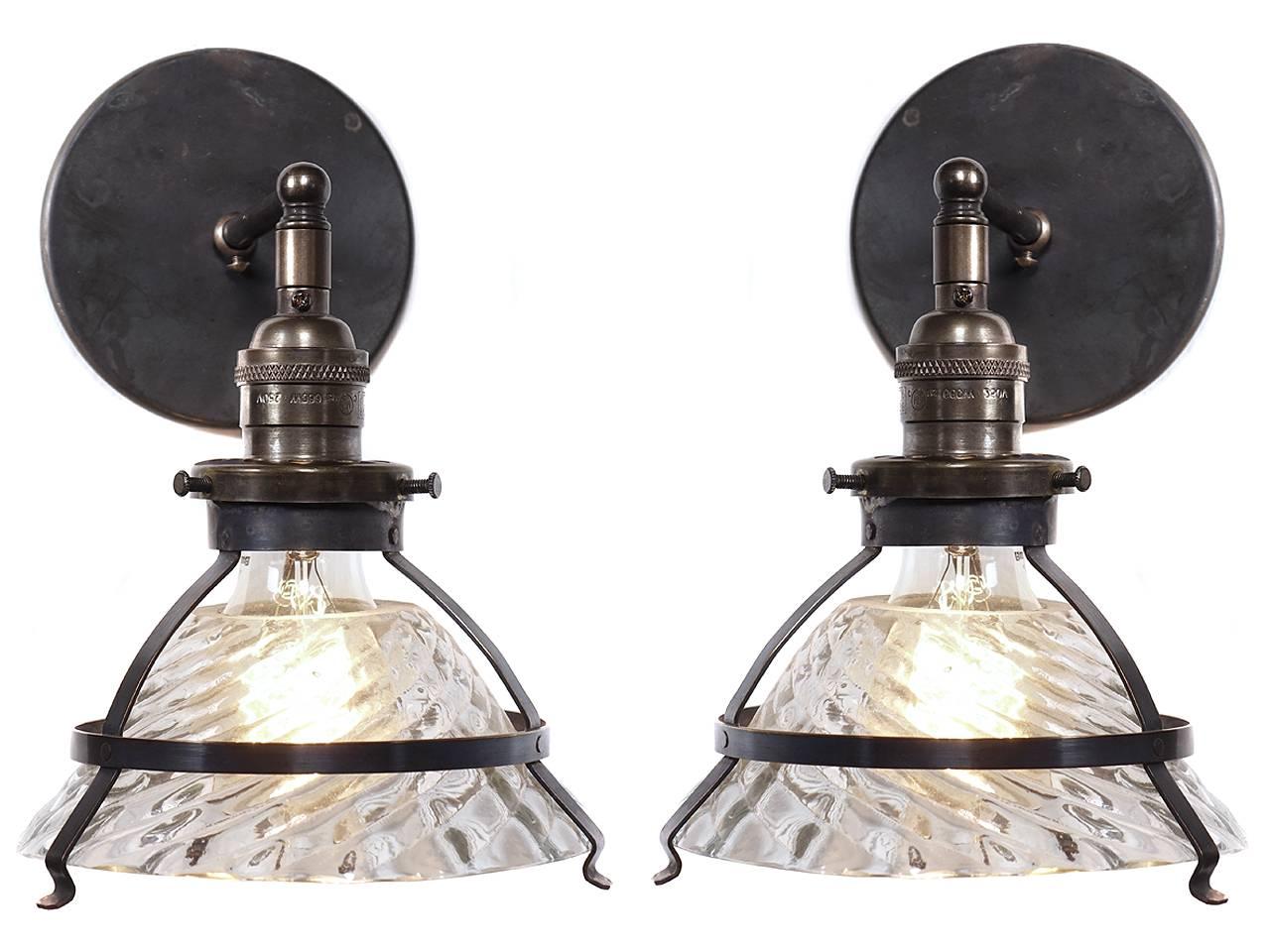 This is a unique industrial snap-in shade fixture. This style of shade was made by the X-Ray Lamp Company as reflectors inside larger lamps. Believe it or not these were never meant to be seen. They have an elegant and complex industrial look. They