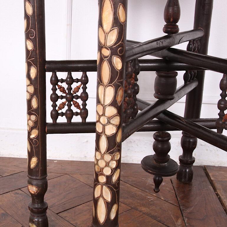 Small inlaid folding table with brass dish top.