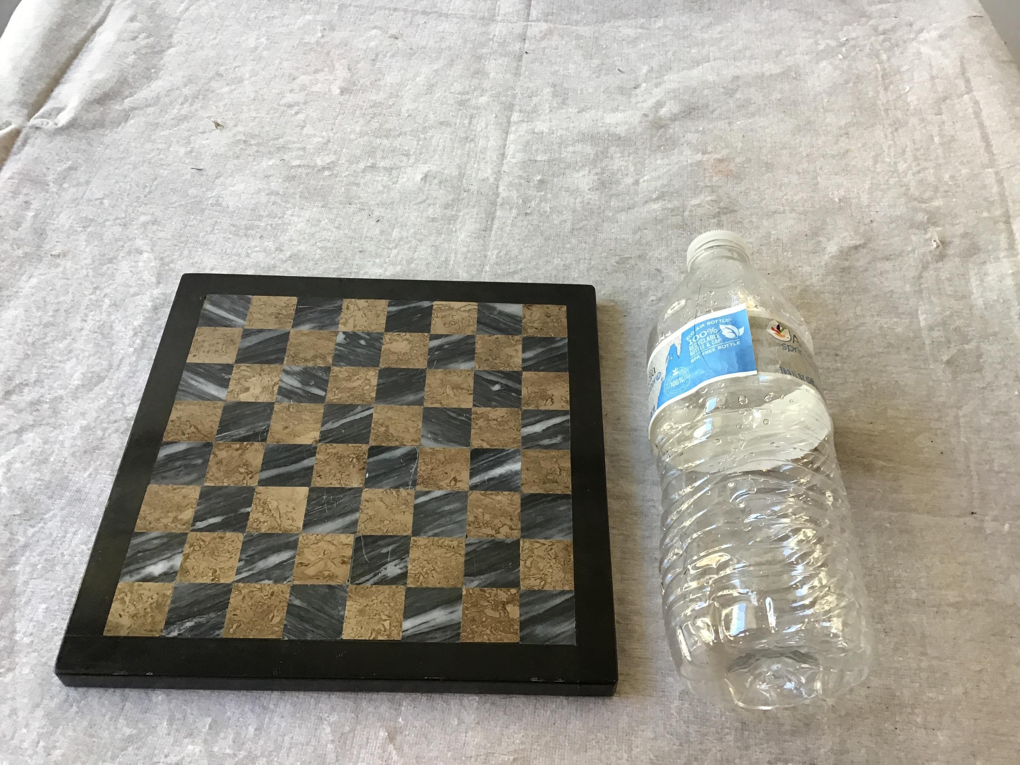 Small inlaid marble chess board.