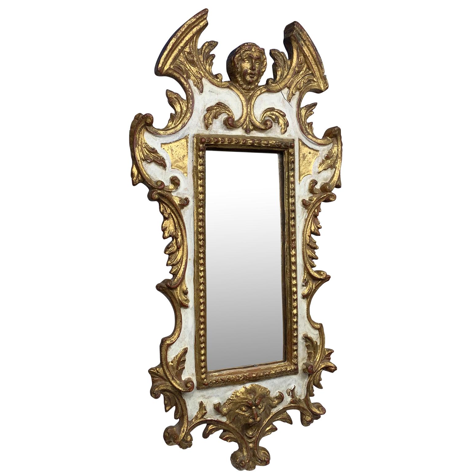 Small Italian Baroque-style gilded wall mirror, Marked Florentia
1950s label on the rear side:
