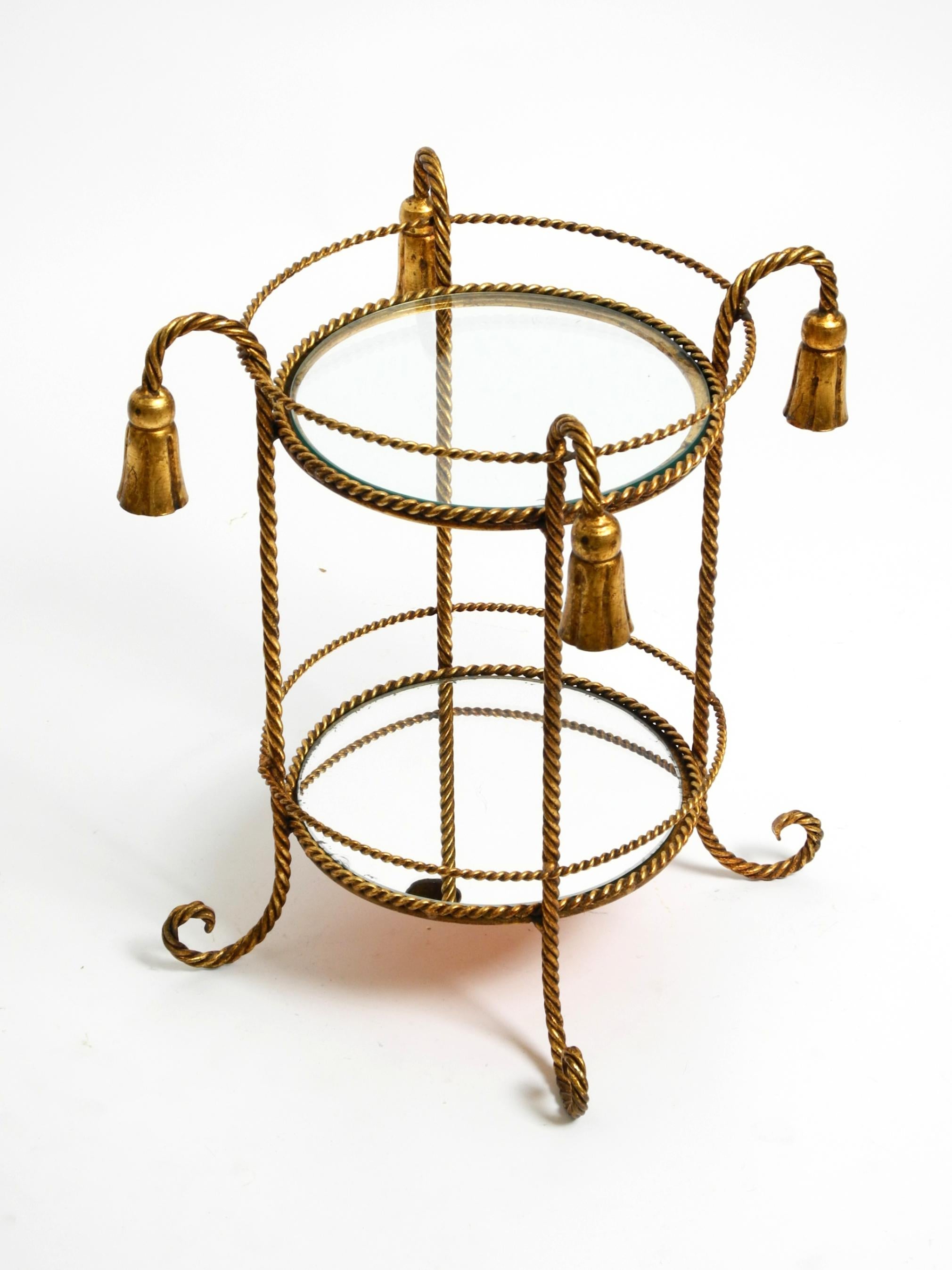 Mid-20th Century Small Italian Mid Century Regency side table made of gilded iron by Li Puma For Sale