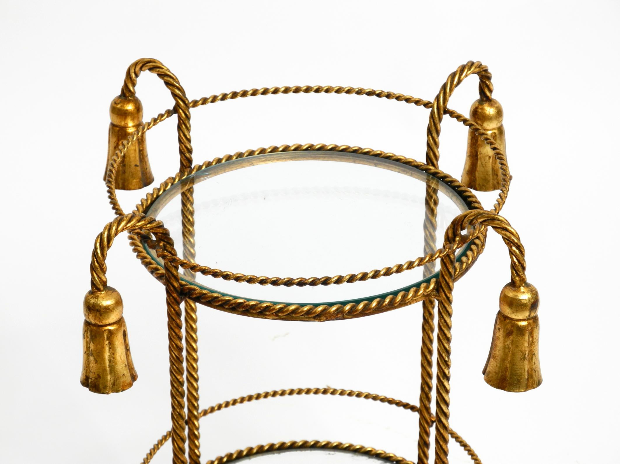 Gold Plate Small Italian Mid Century Regency side table made of gilded iron by Li Puma For Sale
