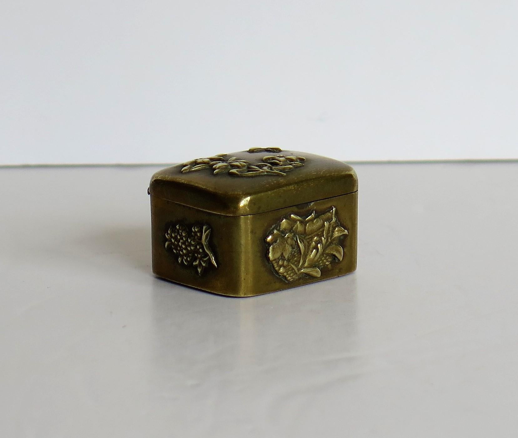 it is a small bronze box with