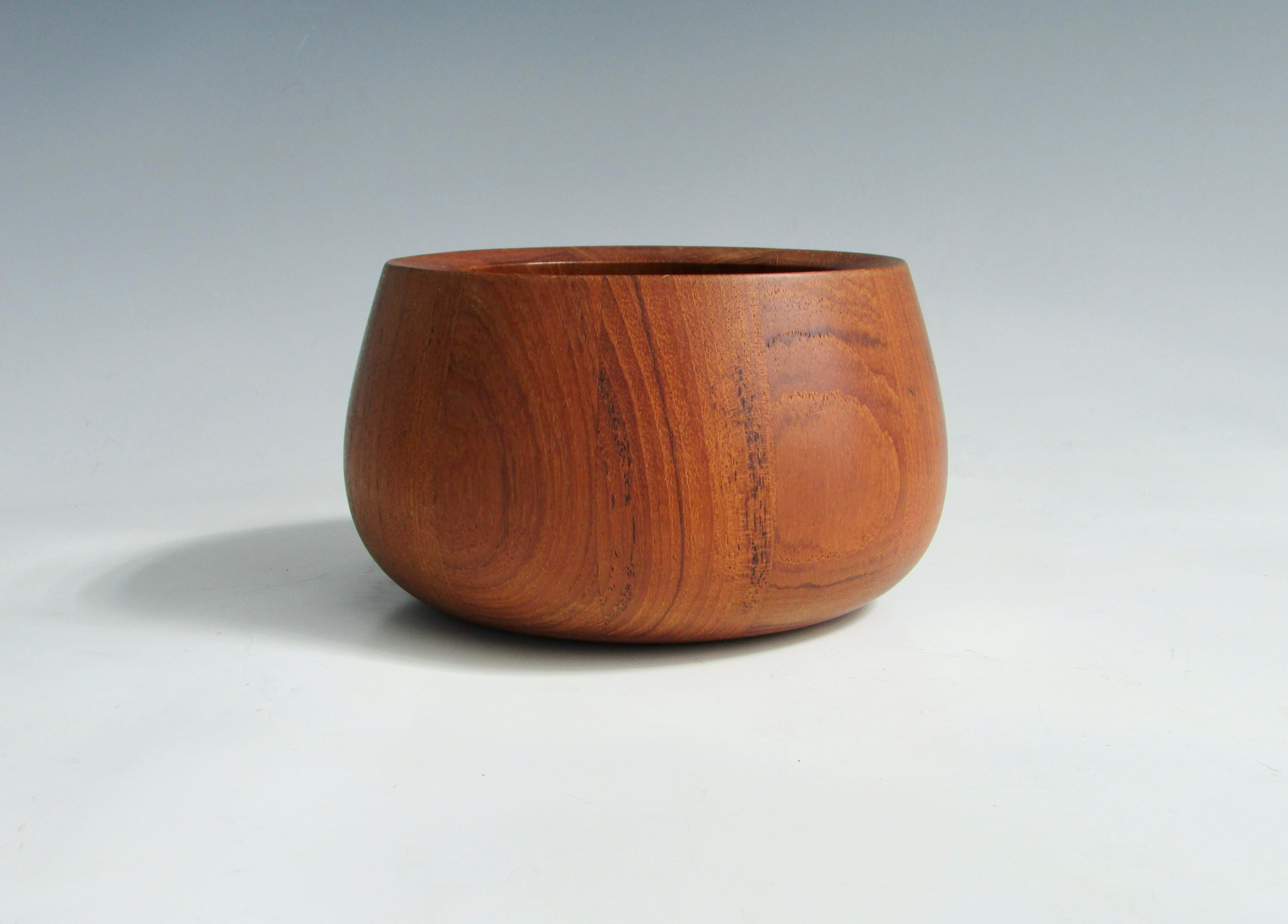 Smaller size Dansk bowl. One I have never seen. Turned teak wood. Fine condition possibly never used. Marked JHQ Dansk Denmark.
