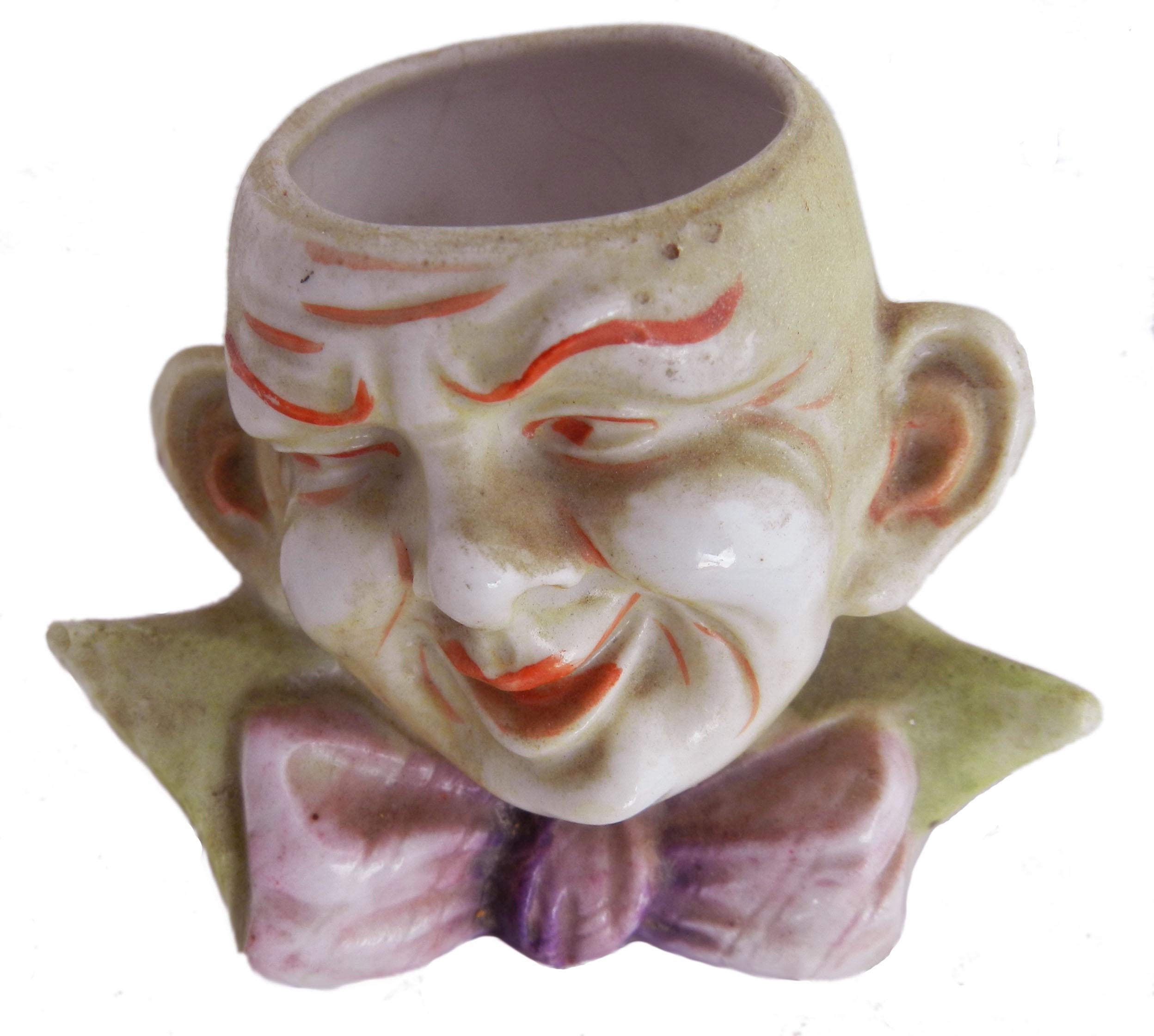 Small Jester face vase good for tooth pick or flowers, circa 1920
Unusual small vase with interesting face
Ideal for tooth picks!
Or else flowers.


         