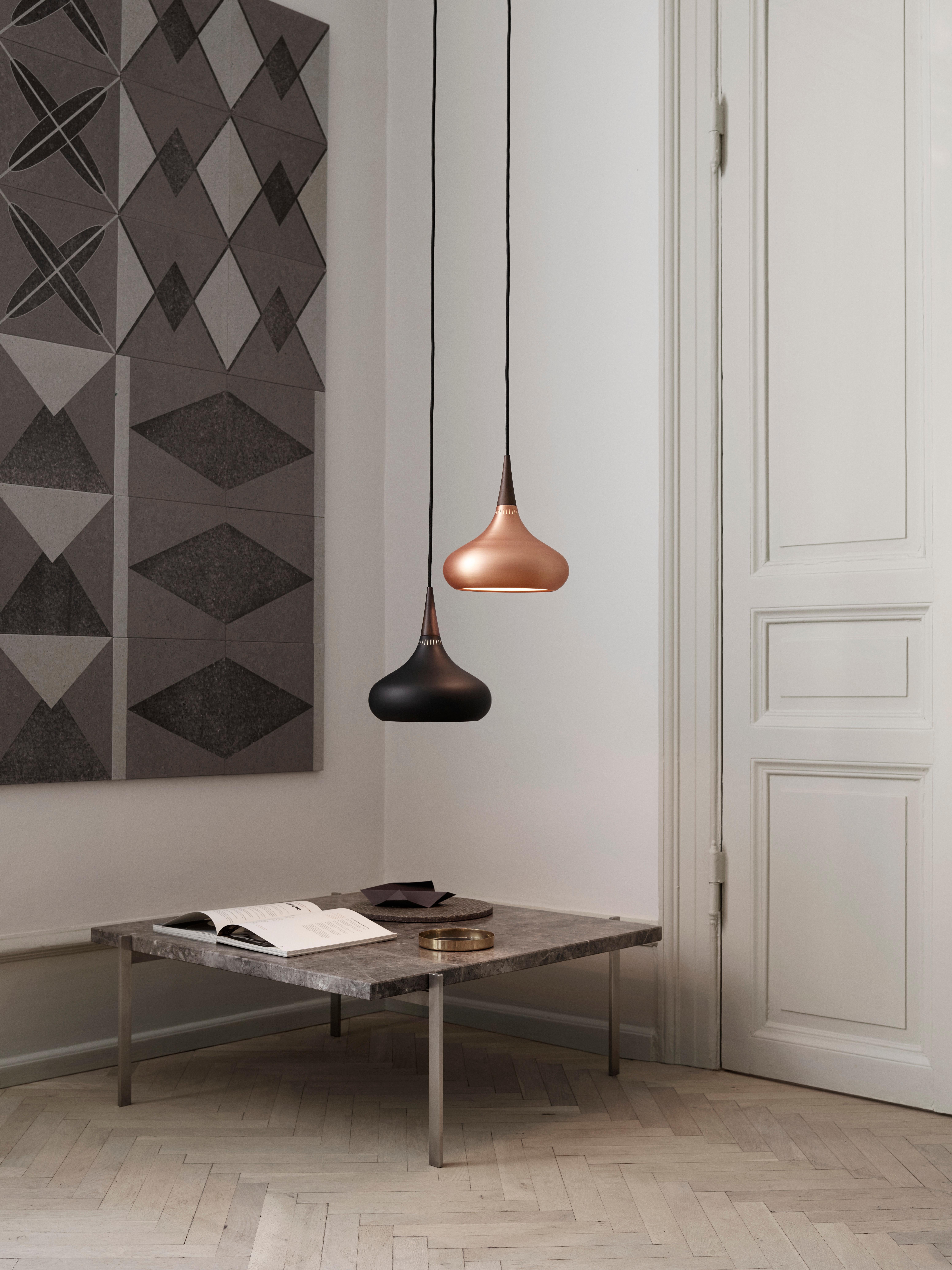 Small Jo Hammerborg 'Orient' Pendant Lamp for Fritz Hansen in Black and Rosewood.

Established in 1872, Fritz Hansen has become synonymous with legendary Danish design. Combining timeless craftsmanship with an emphasis on sustainability, the brand’s