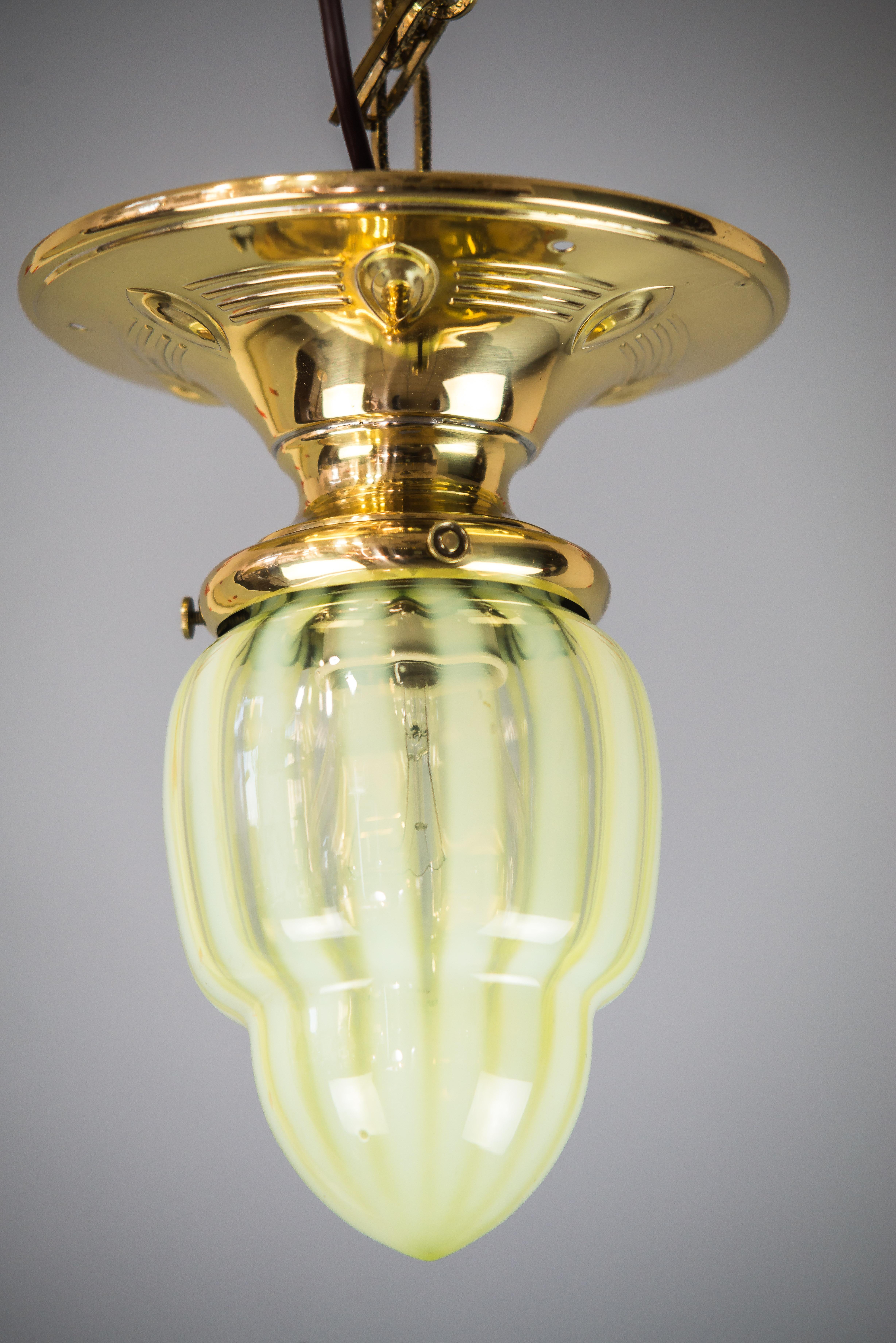 Small Jugendstil ceiling lamp with original yellow/green opaline glass
Polished and stove enameled.