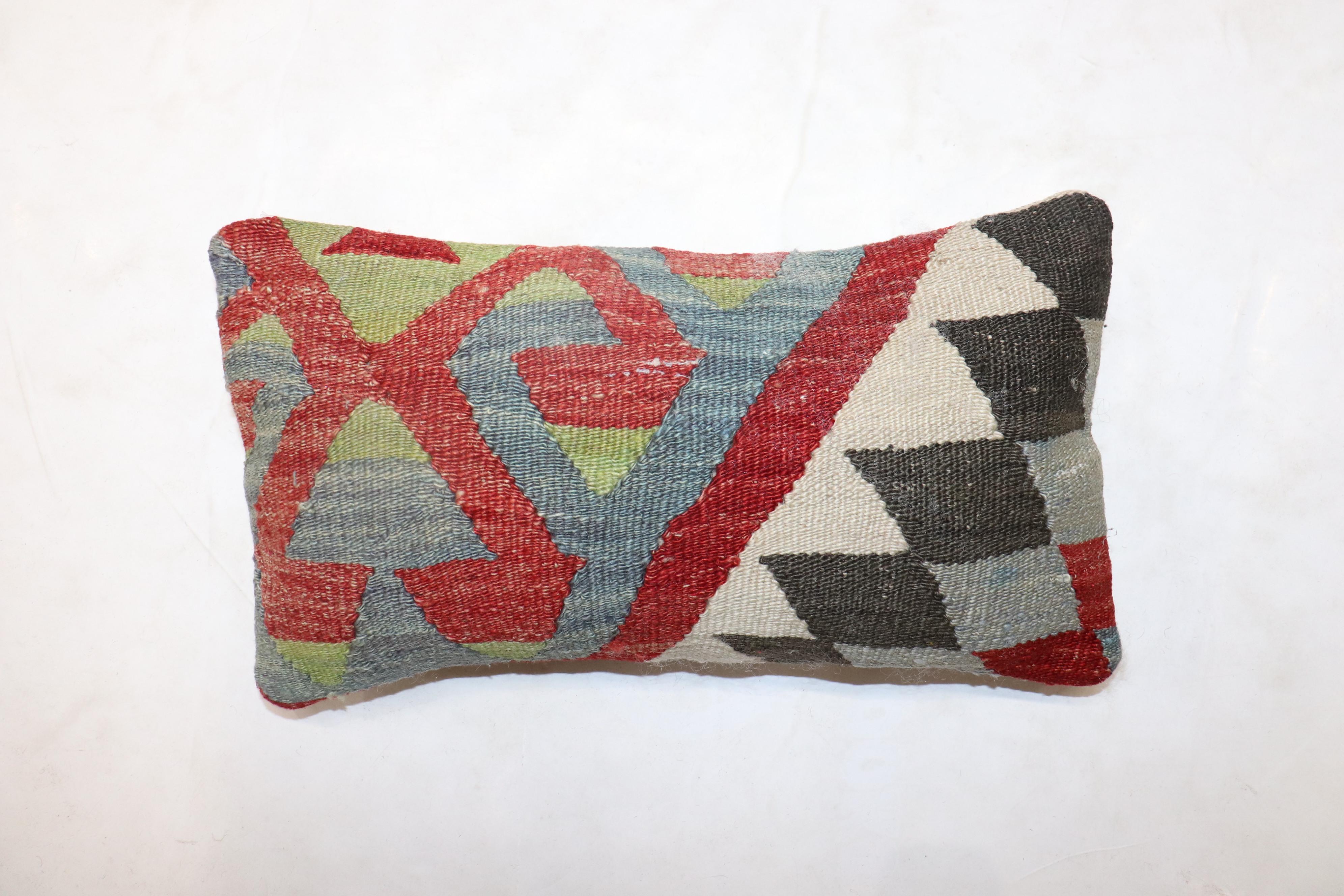 Small size pillow made from an antique Turkish Kilim flat-weave. 

Measures: 9” x 16''.