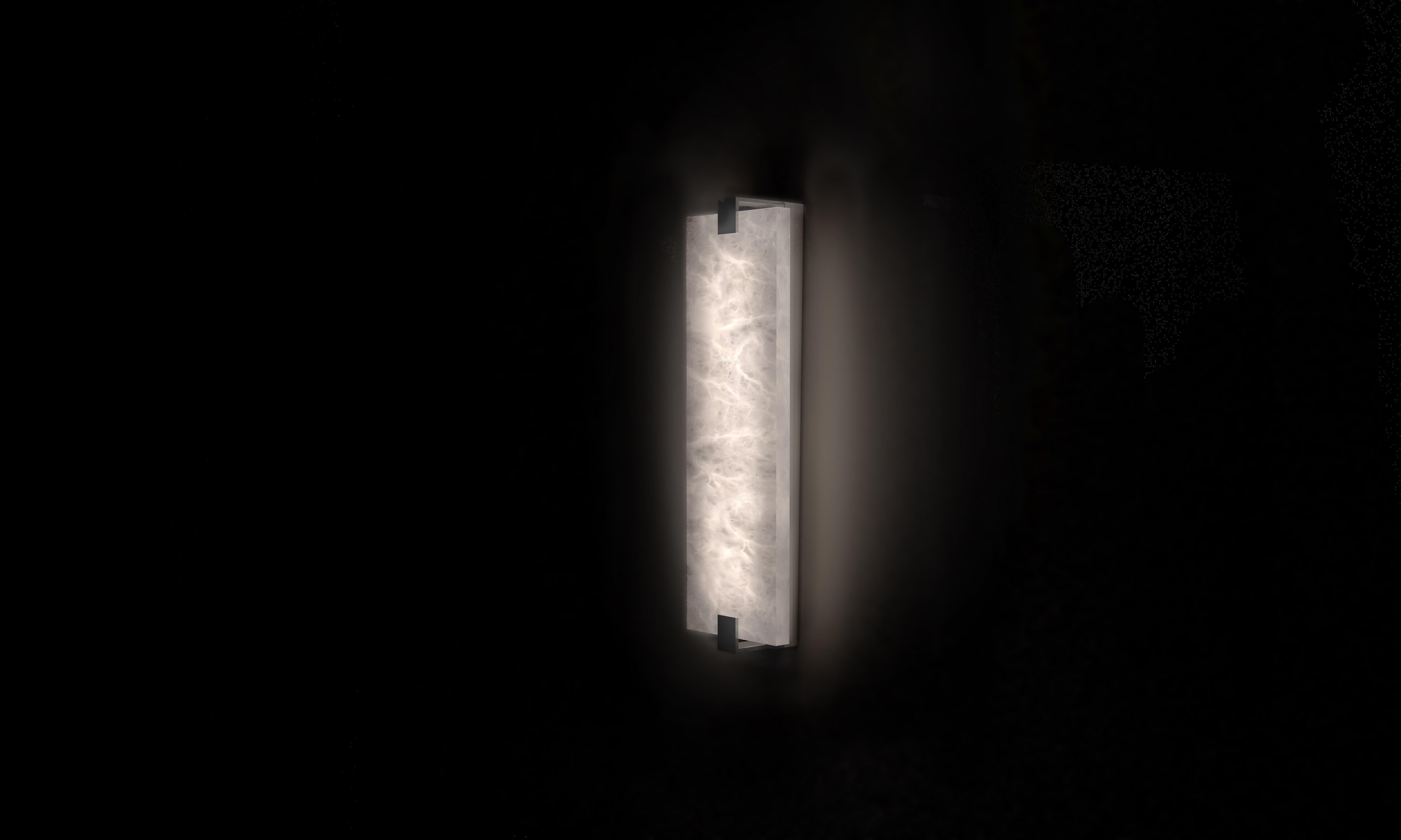 Small Kinkairo Wall Lamp by Alabastro Italiano
Dimensions: D 8 x W 15 x H 50 cm.
Materials: White alabaster, metal (Shiny Silver).
Available in other finishes and sizes.

1 x Strip LED
21.6 W/m

All our lamps can be wired according to each country.